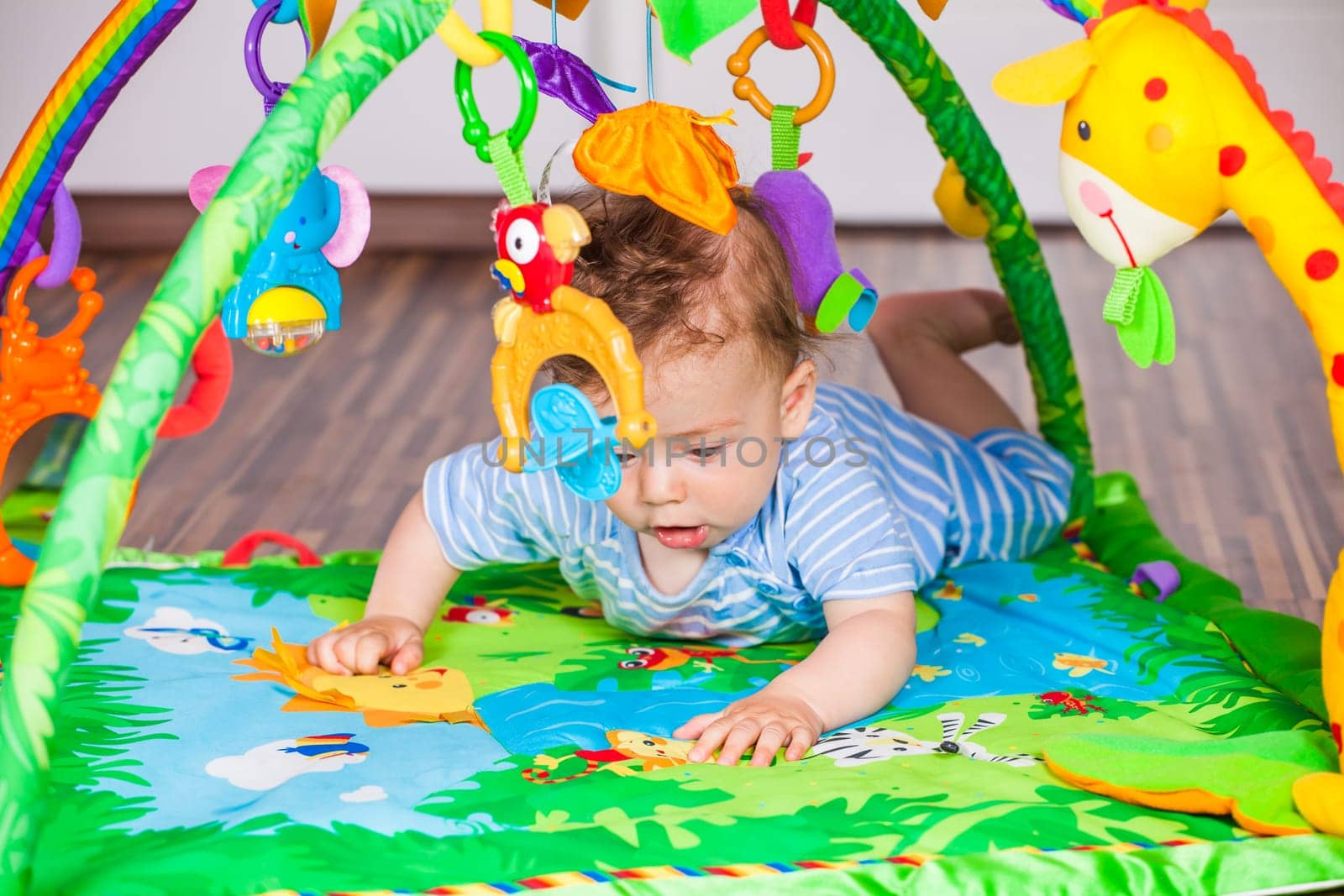 Portrait of a 7 months old baby boy at home.
