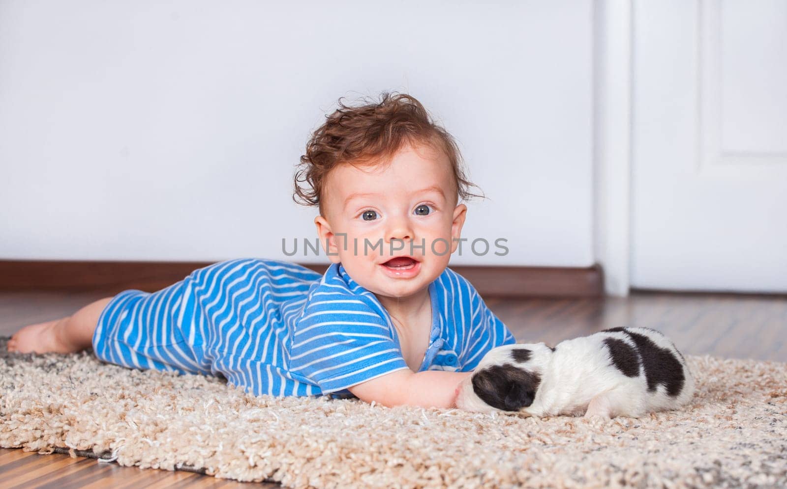 Portrait of a 7 months old baby boy at home.