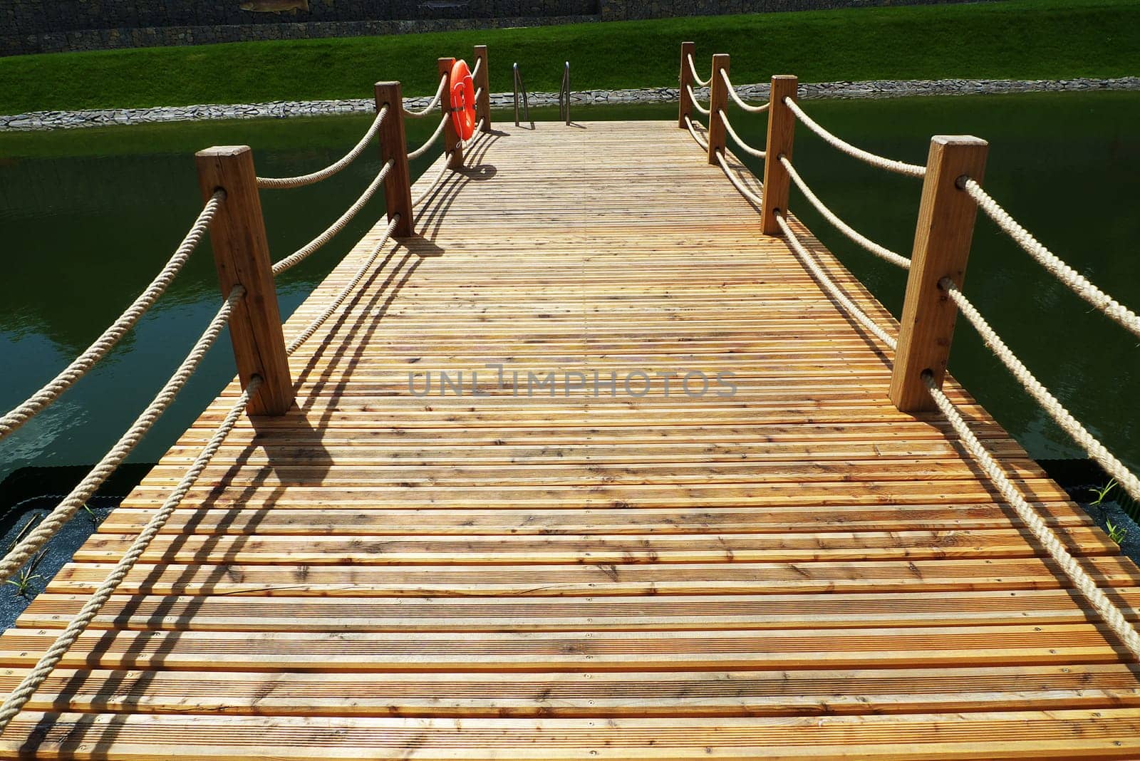 Deck on swimming pool in nature