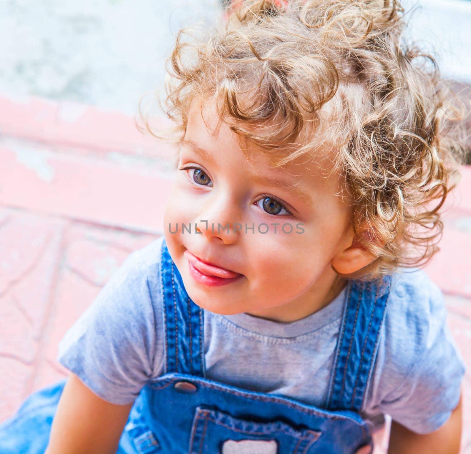 Portrait of 1 year old baby boy at home.