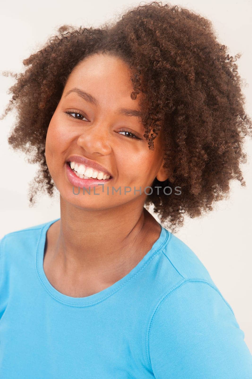 Beautiful young woman smiling for the camera