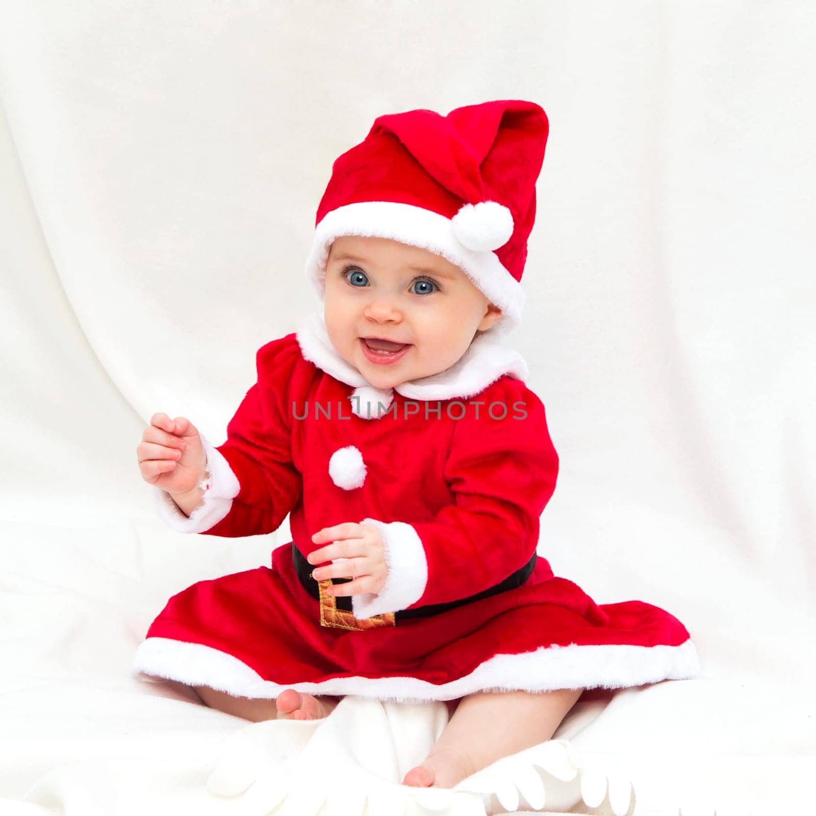 Little Baby Girl Dressed in Santa Costume