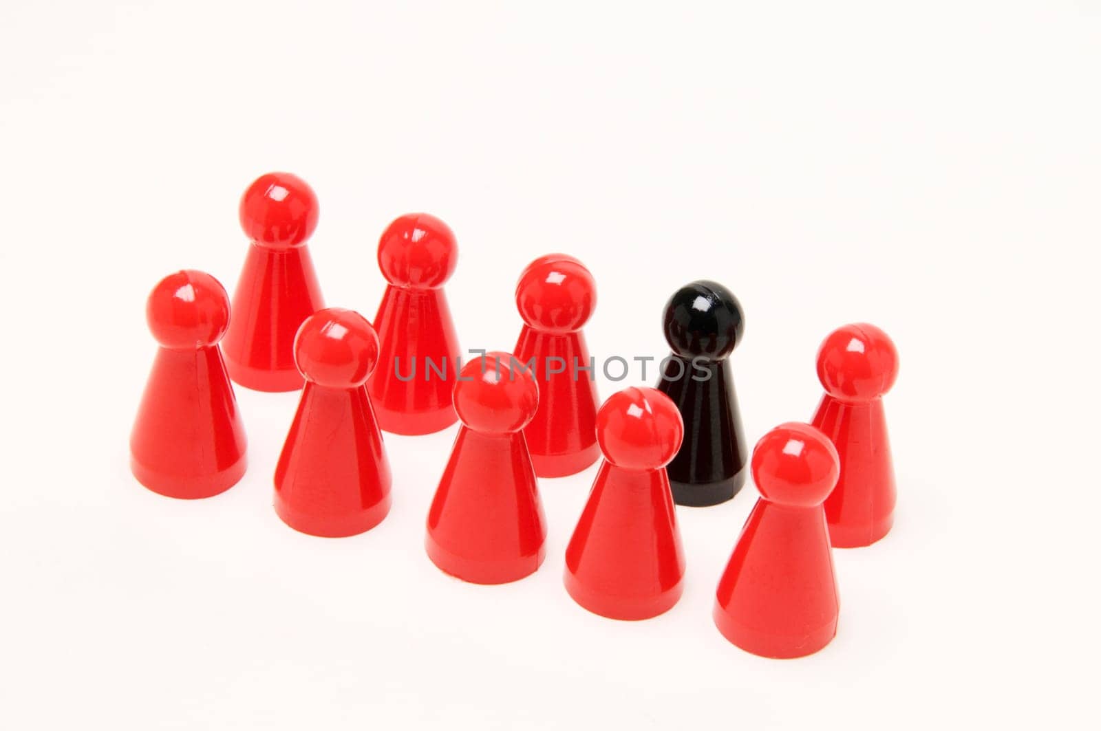 Still lifes: Group of 9 red and one black man-angry-you-not-figures in block of tens to two rows on white background