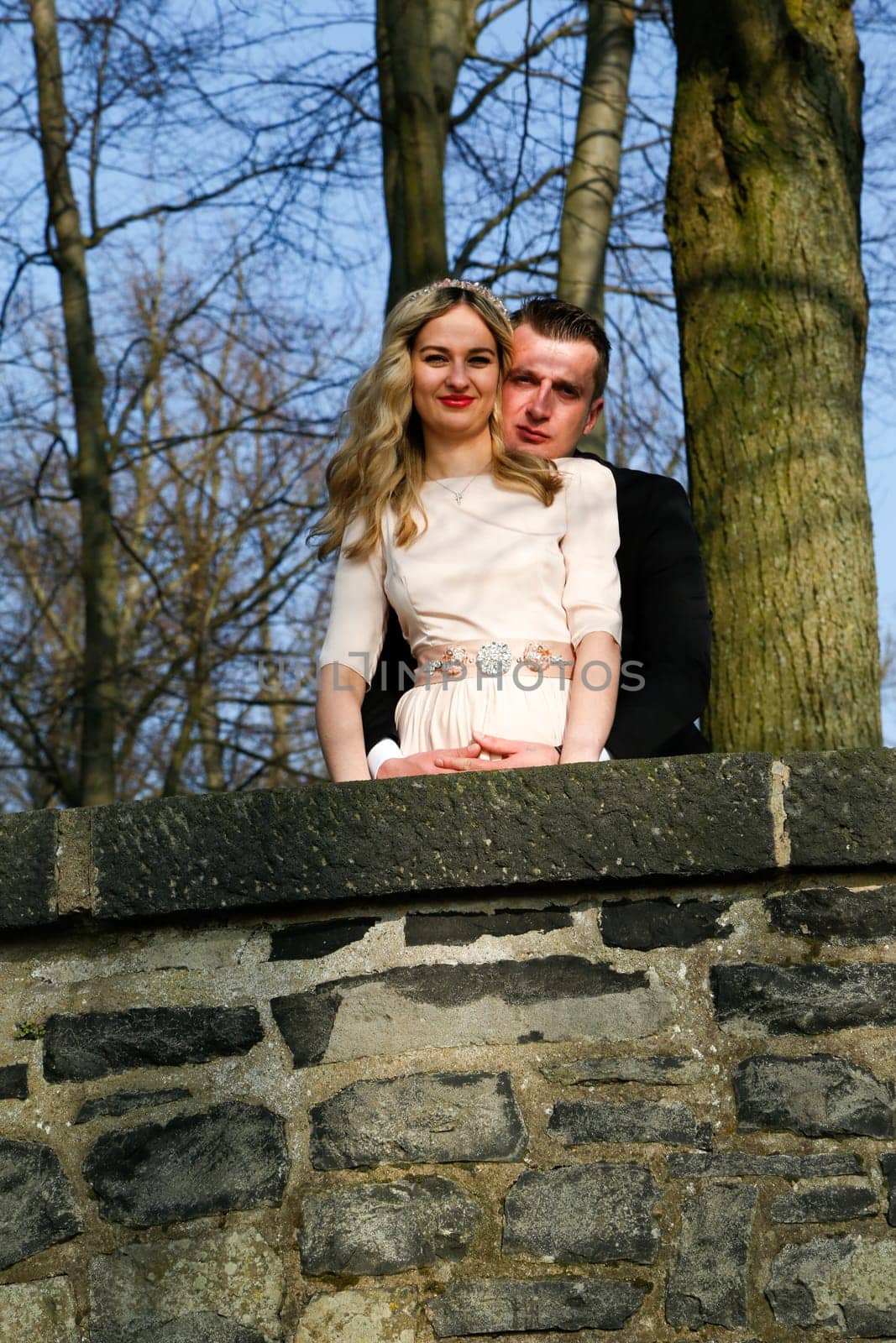 Enamoured couple enjoying their love in the garden