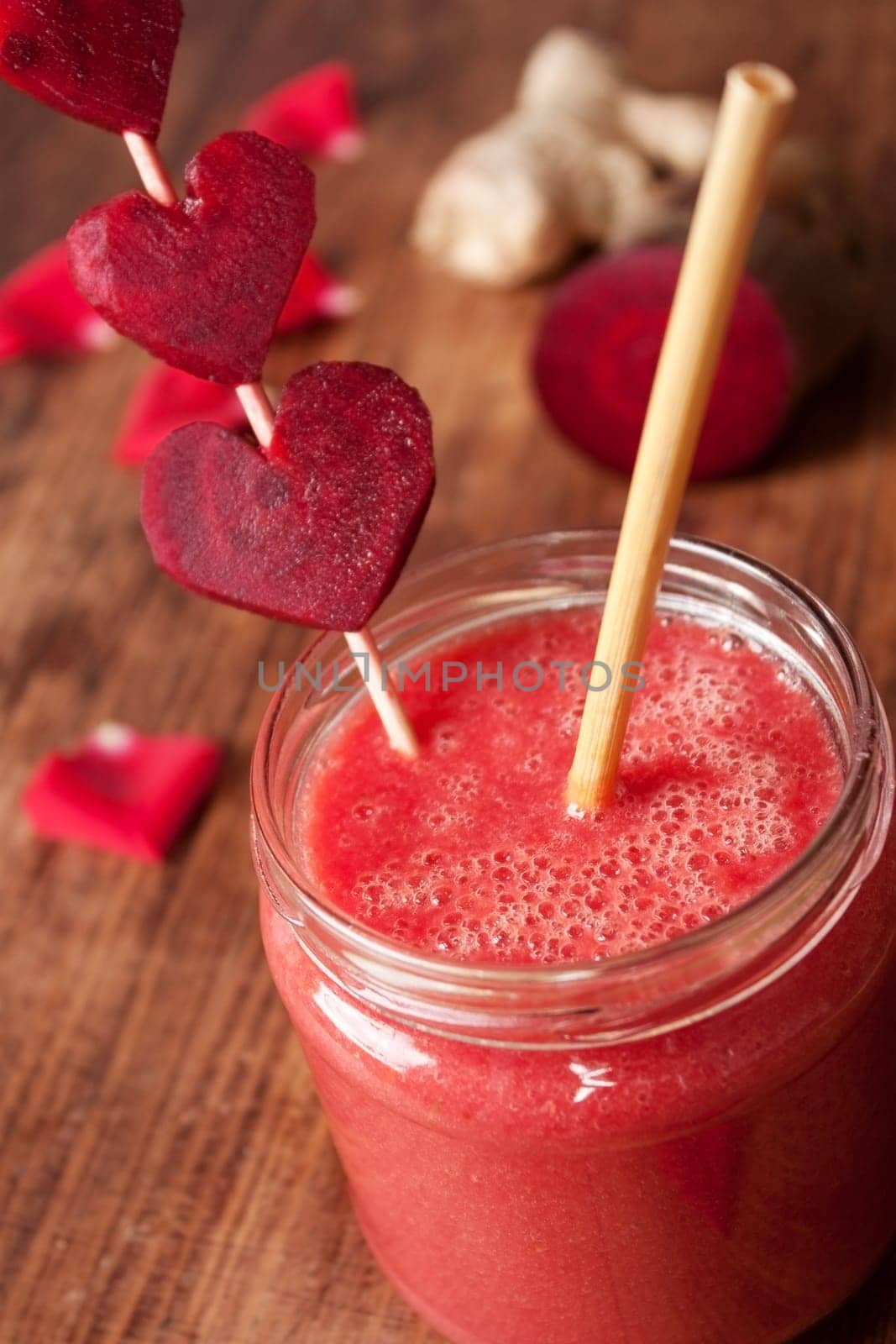 red smoothie with beet,raspberry,rose petals and ginger
