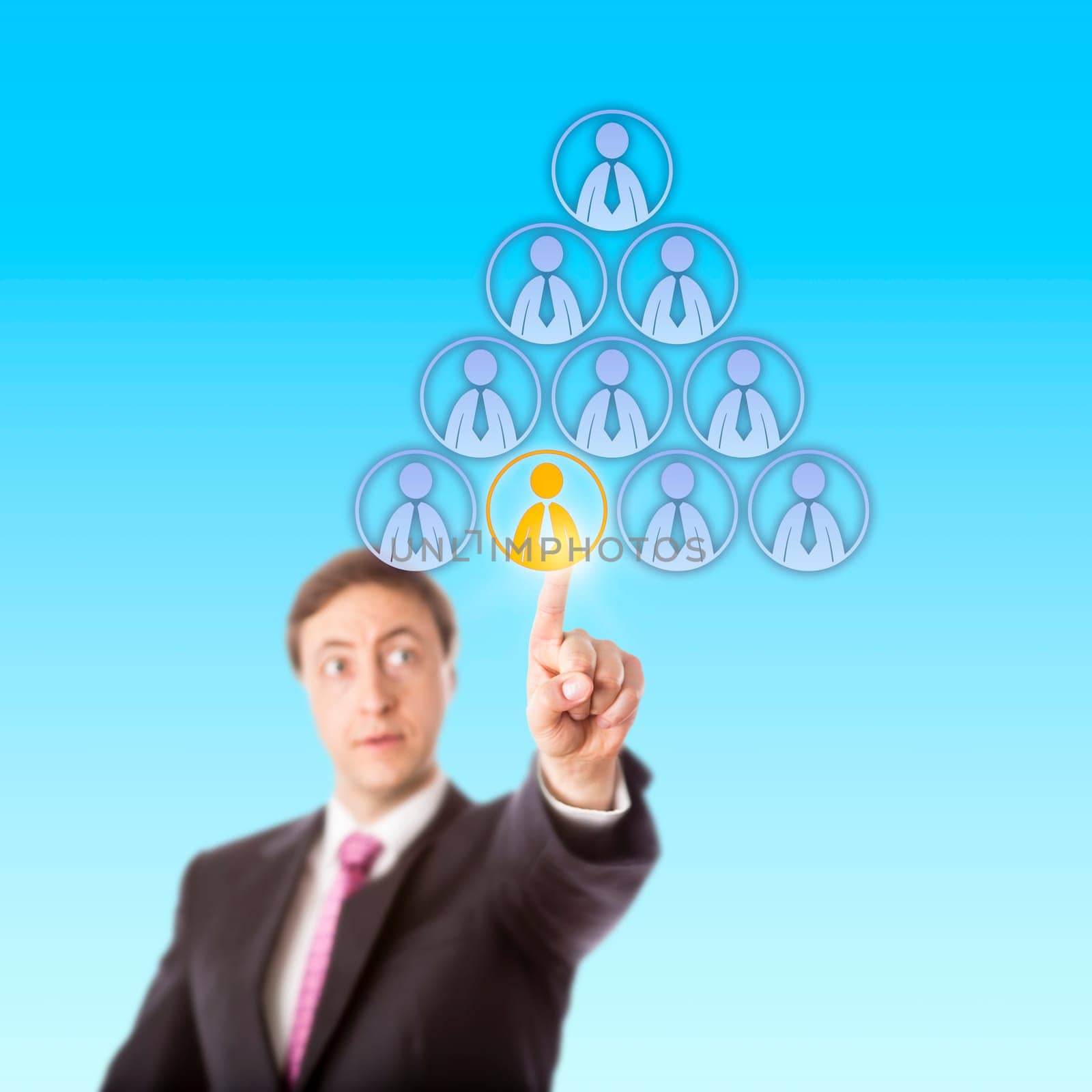 Focused manager is reaching up to single out by touch a male office worker at the bottom of a pyramidal hierarchy of male worker icons. Business metaphor for headhunt, success or discrimination.
