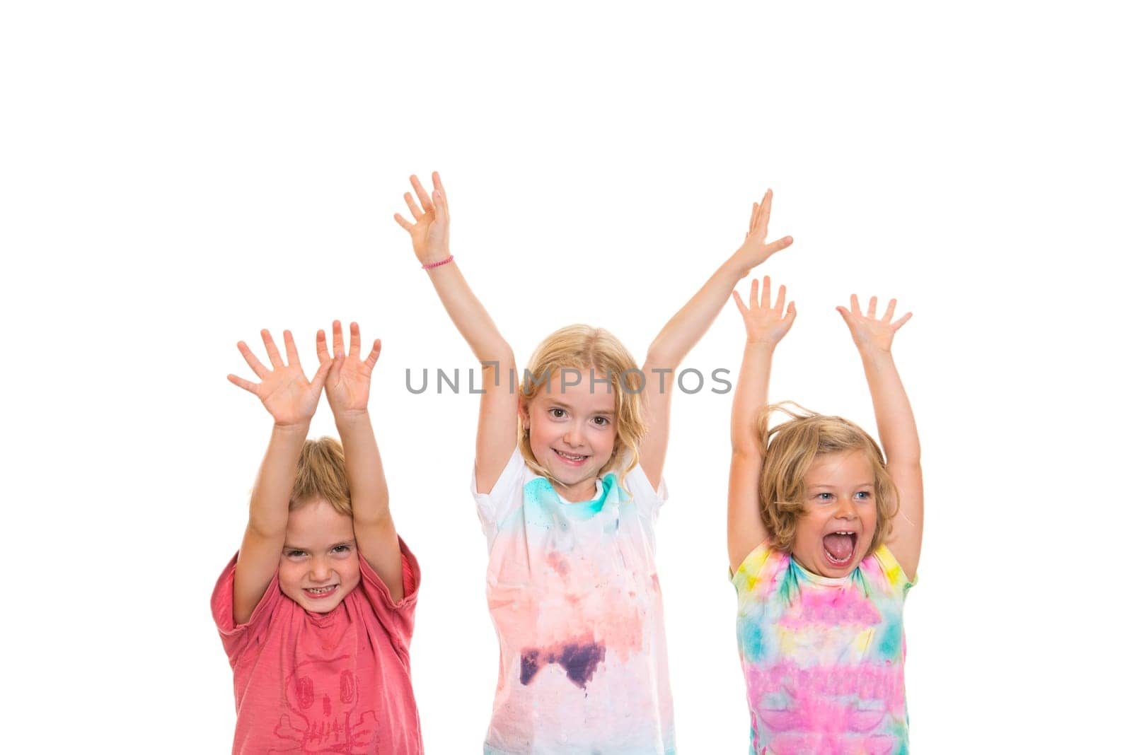funny children jubilating in front of white background