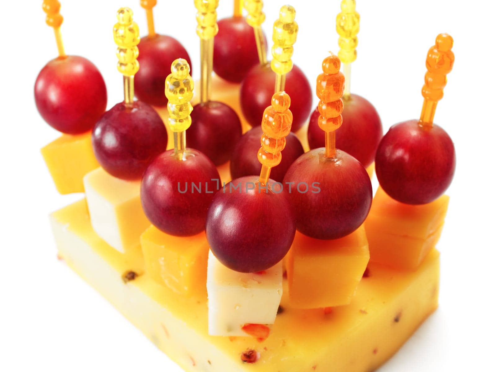 Cheese appetizers isolated on white