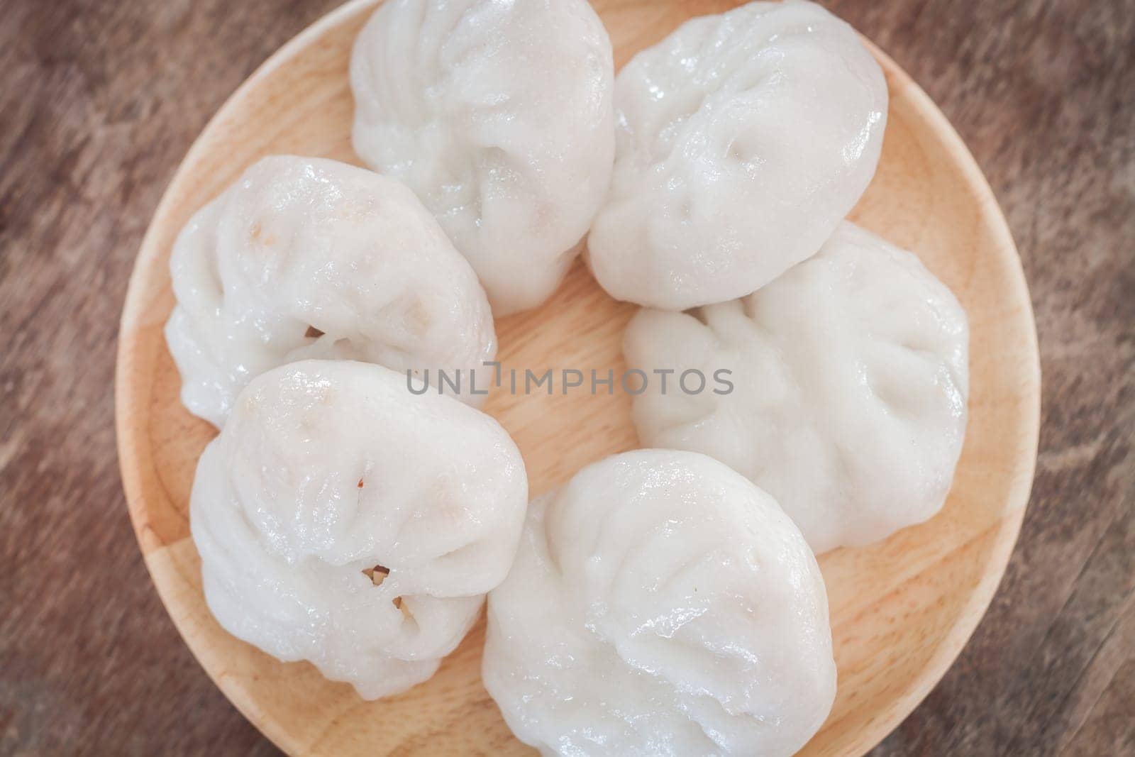 Chinese leek steamed dessert on wooden table, stock photo