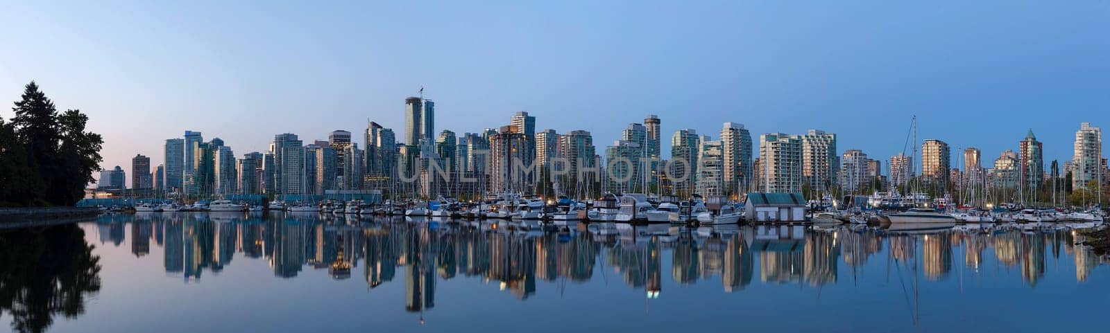 Vancouver British Columbia Canada City Skyline by the Harbor View from Stanley Park along False Creek at Sunrise Panorama