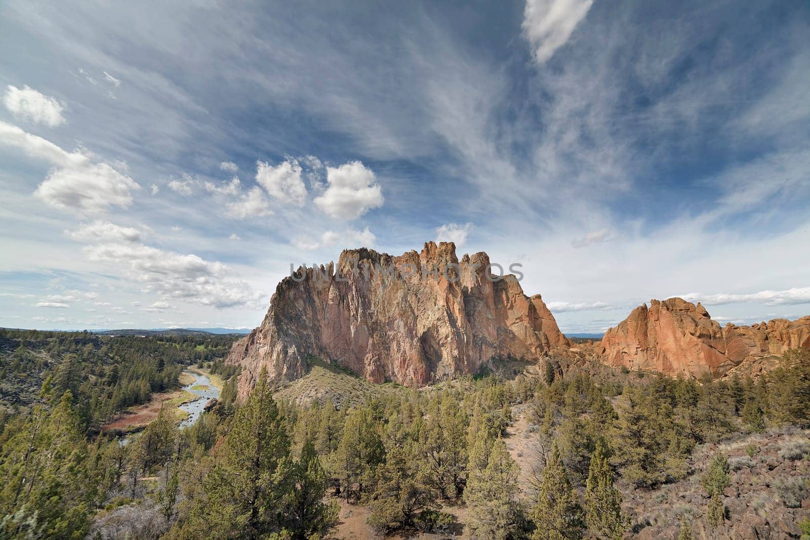 Smith Rock State Park in Terrebonne Oregon with White Clouds and Blue Sky