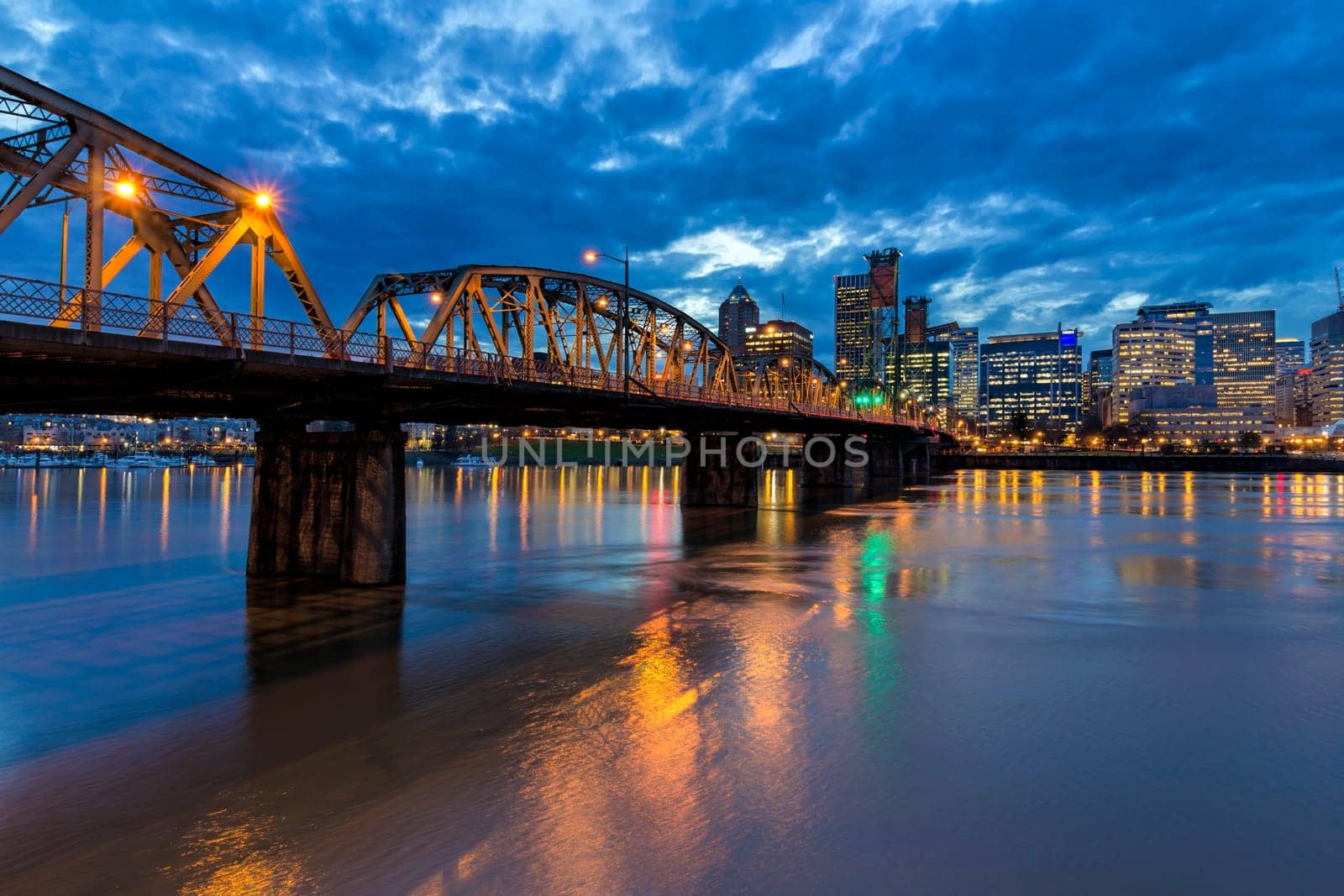 Hawthorne Bridge Over Willamette River to Portland Oregon Downtown During Evening Blue Hour