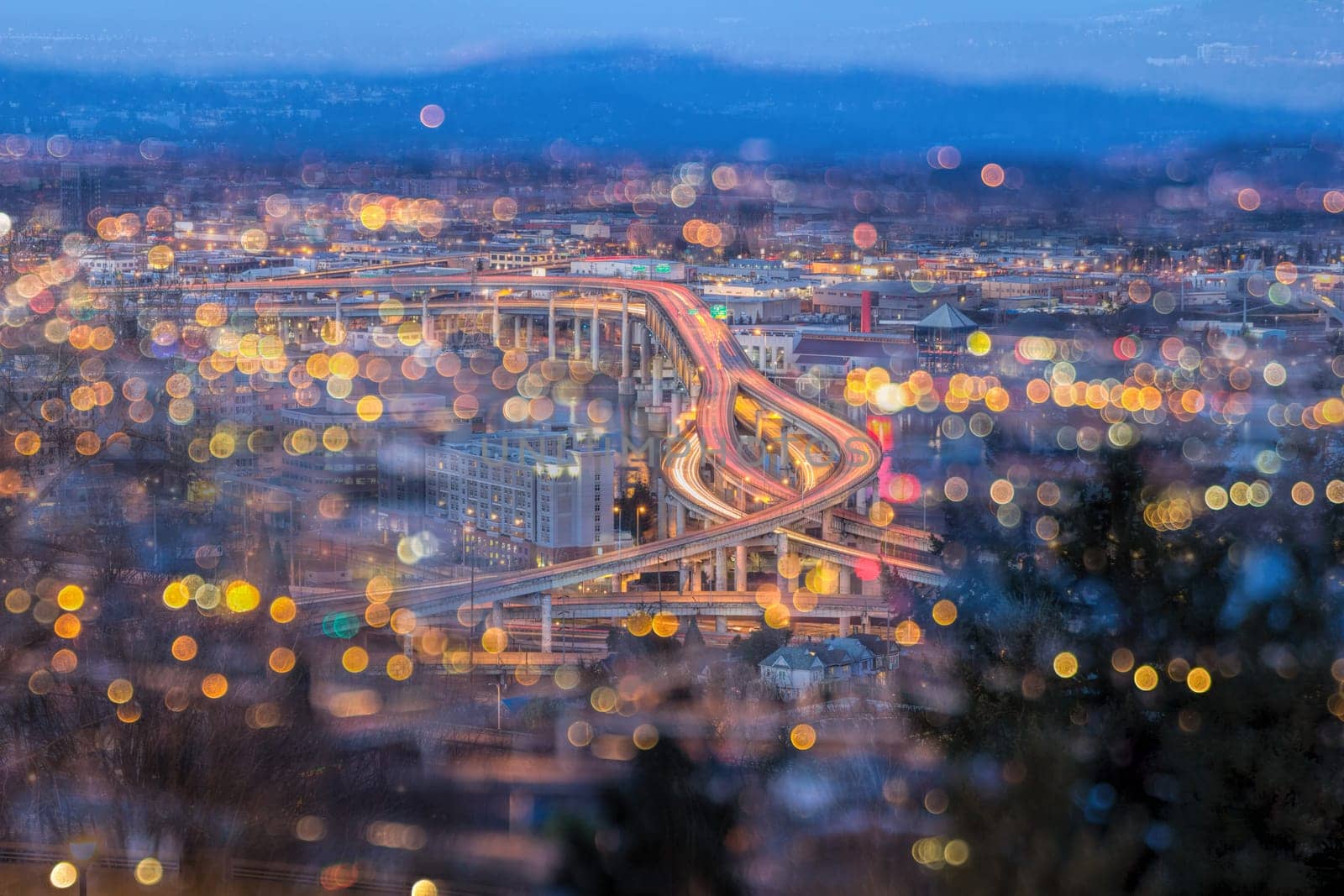 Portland Oregon Marquam Freeway Light Trails with Blurred Out of Focus Bokeh City Lights during Evening Blue Hour