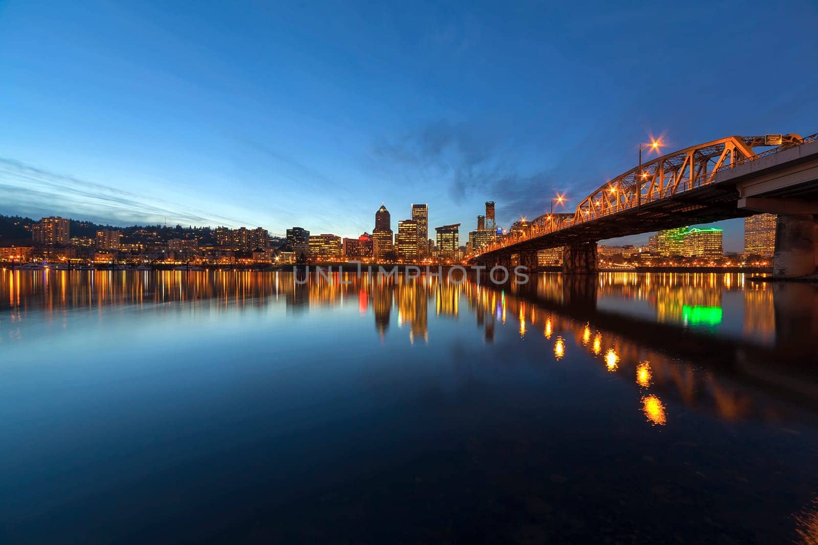 Portland Oregon Downtown City Skyline Along Willamette River by the Hawthorne Bridge at Evening Blue Hour