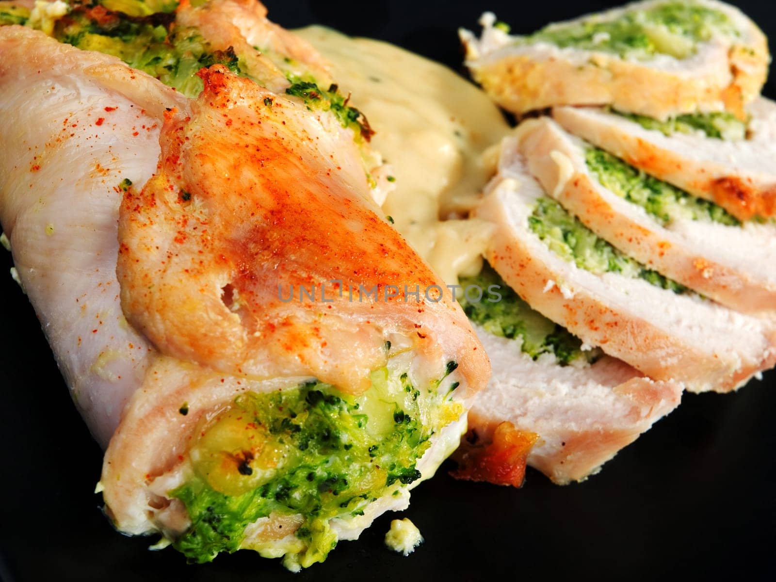 Stuffed chicken rolls with broccoli and vegetables