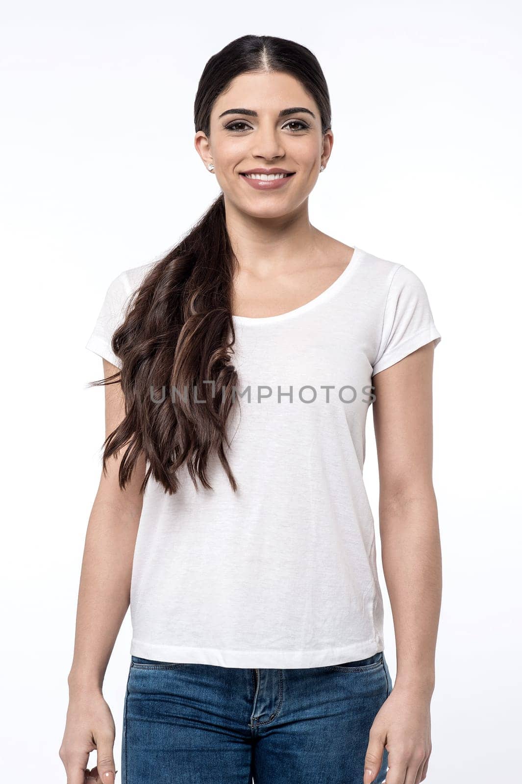 Image of a beautiful woman casually posing to camera