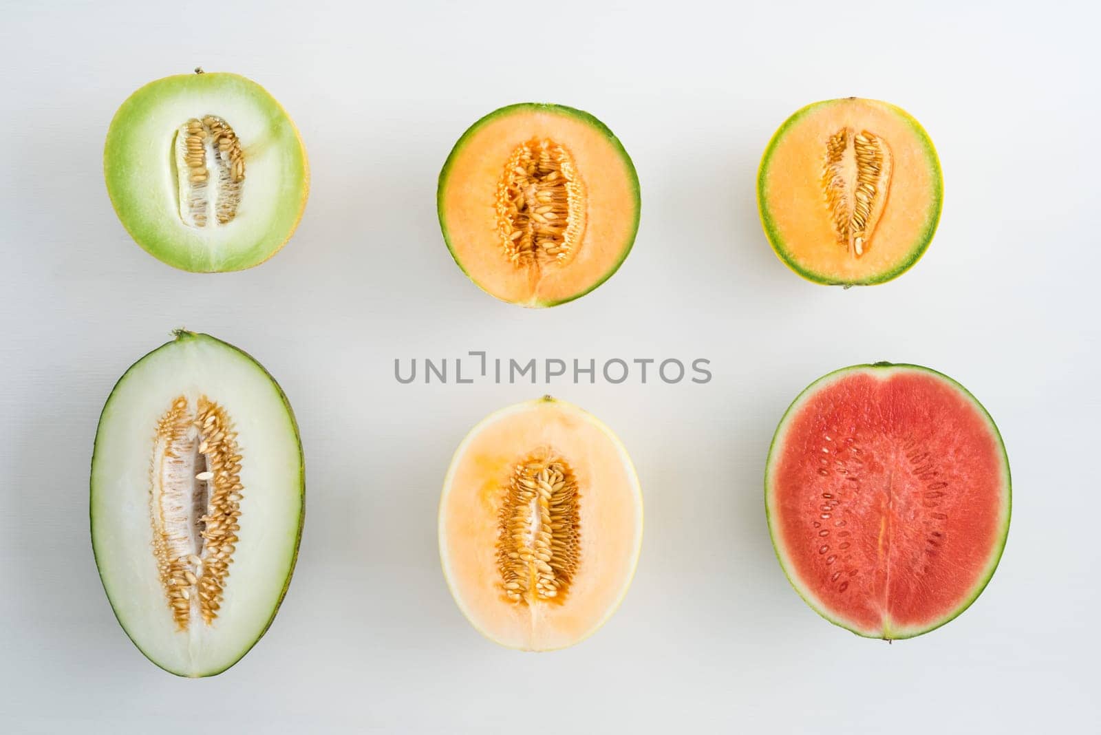 Collection of various sliced melon varieties on one table