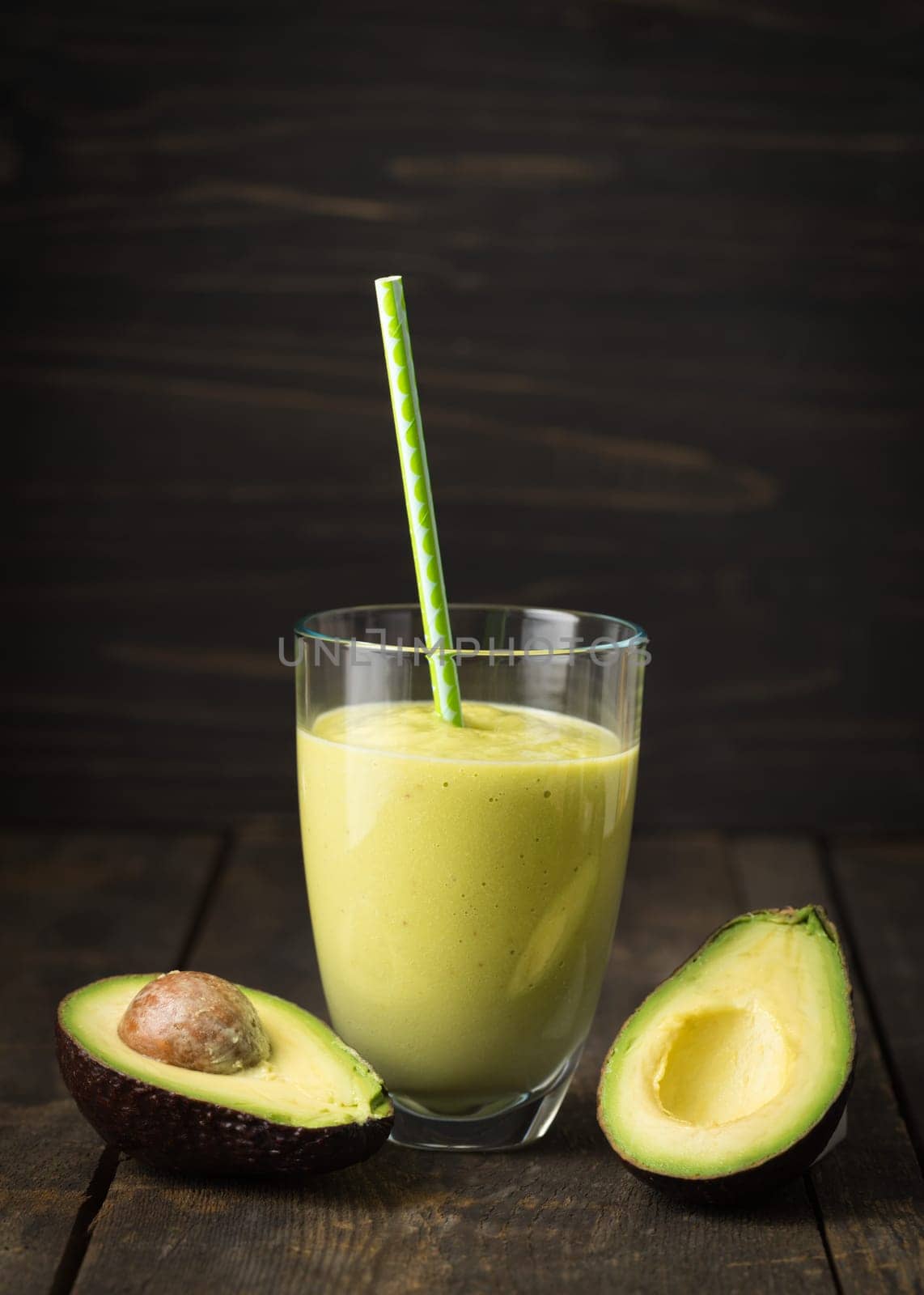 Green smoothie with avocado in the glass