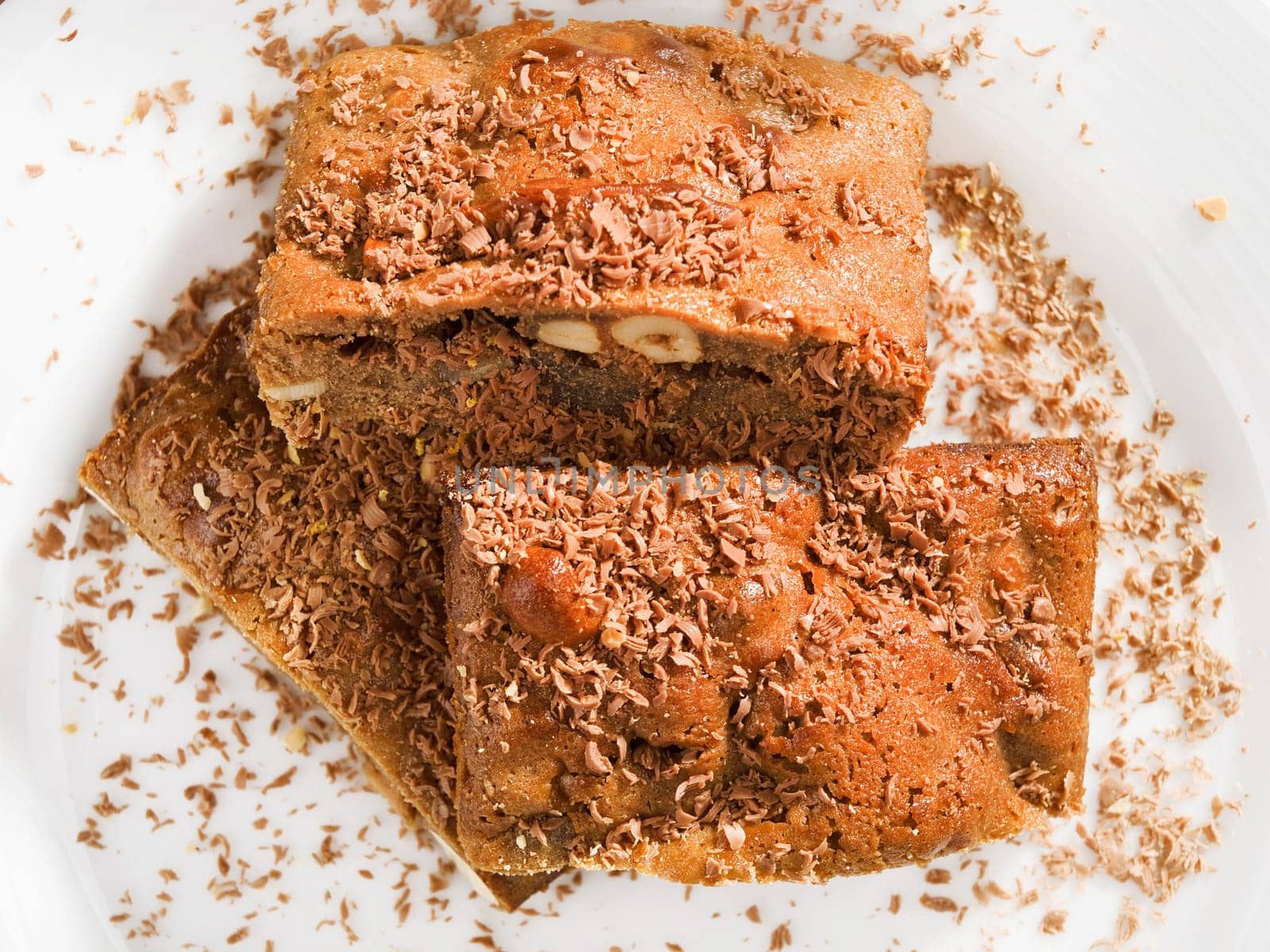 Chocolate brownie with nuts, close up