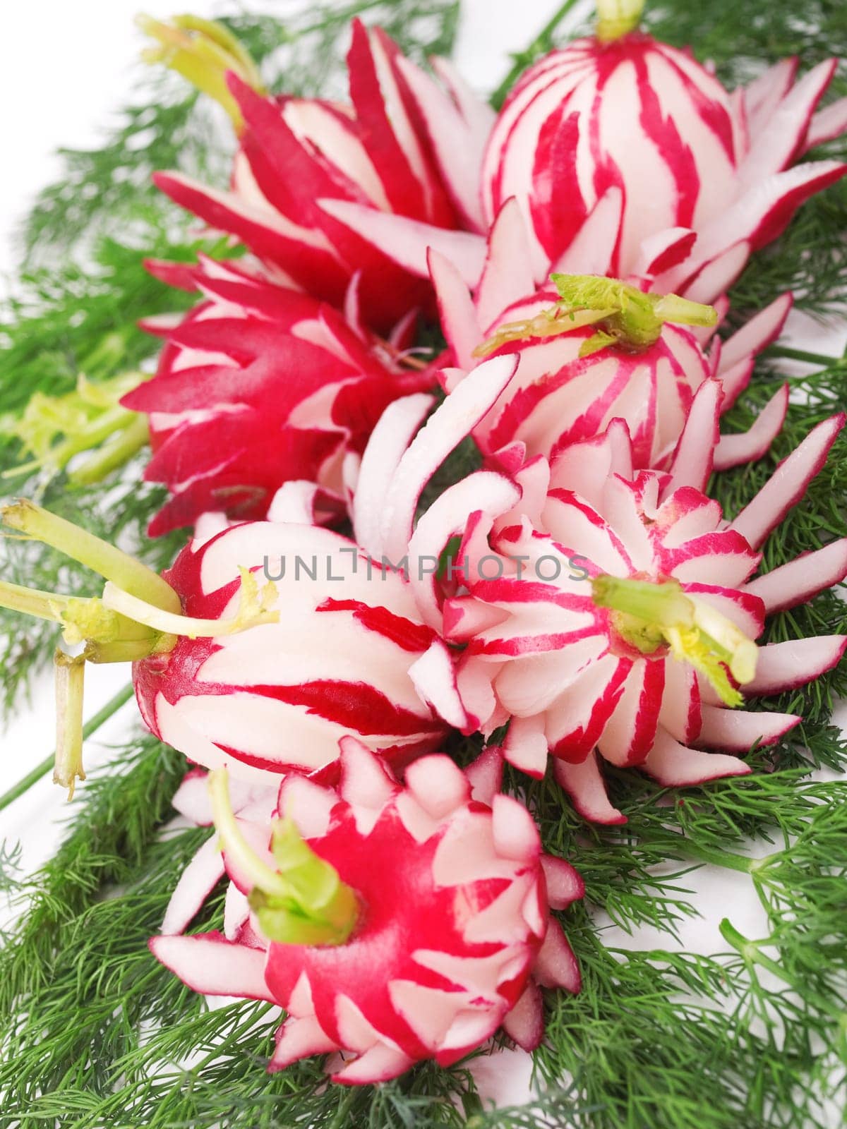 Food carving with radish made like flowers