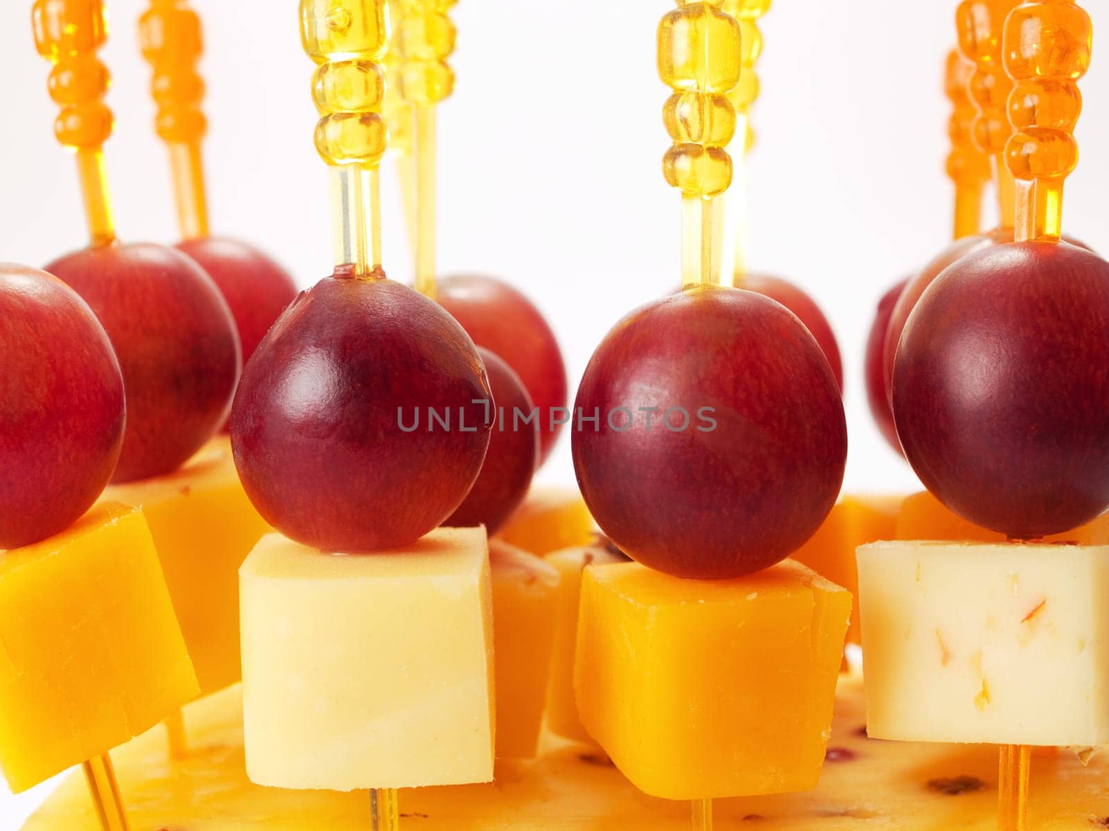 Cheese appetizers isolated on white