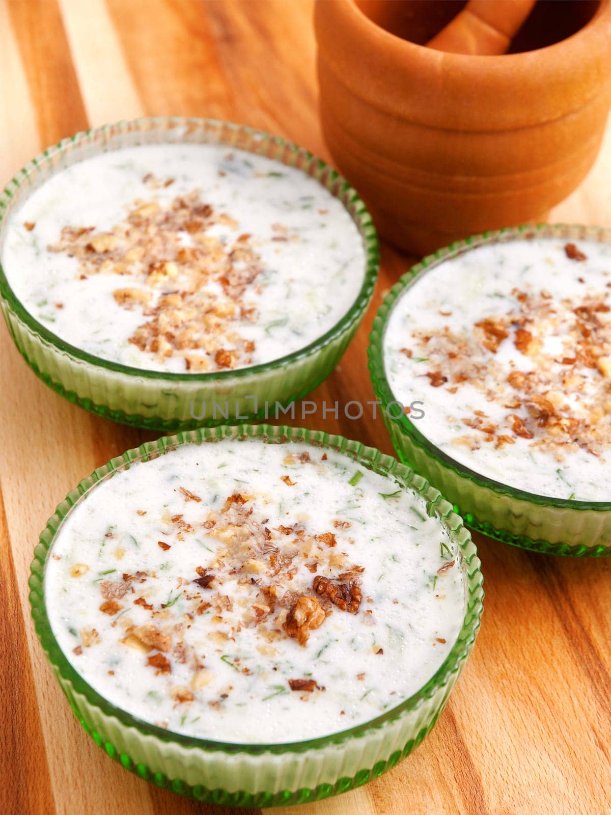 Bulgarian tarator is a famous traditional soup made of fresh grated cucumbers, garlic and yogurt