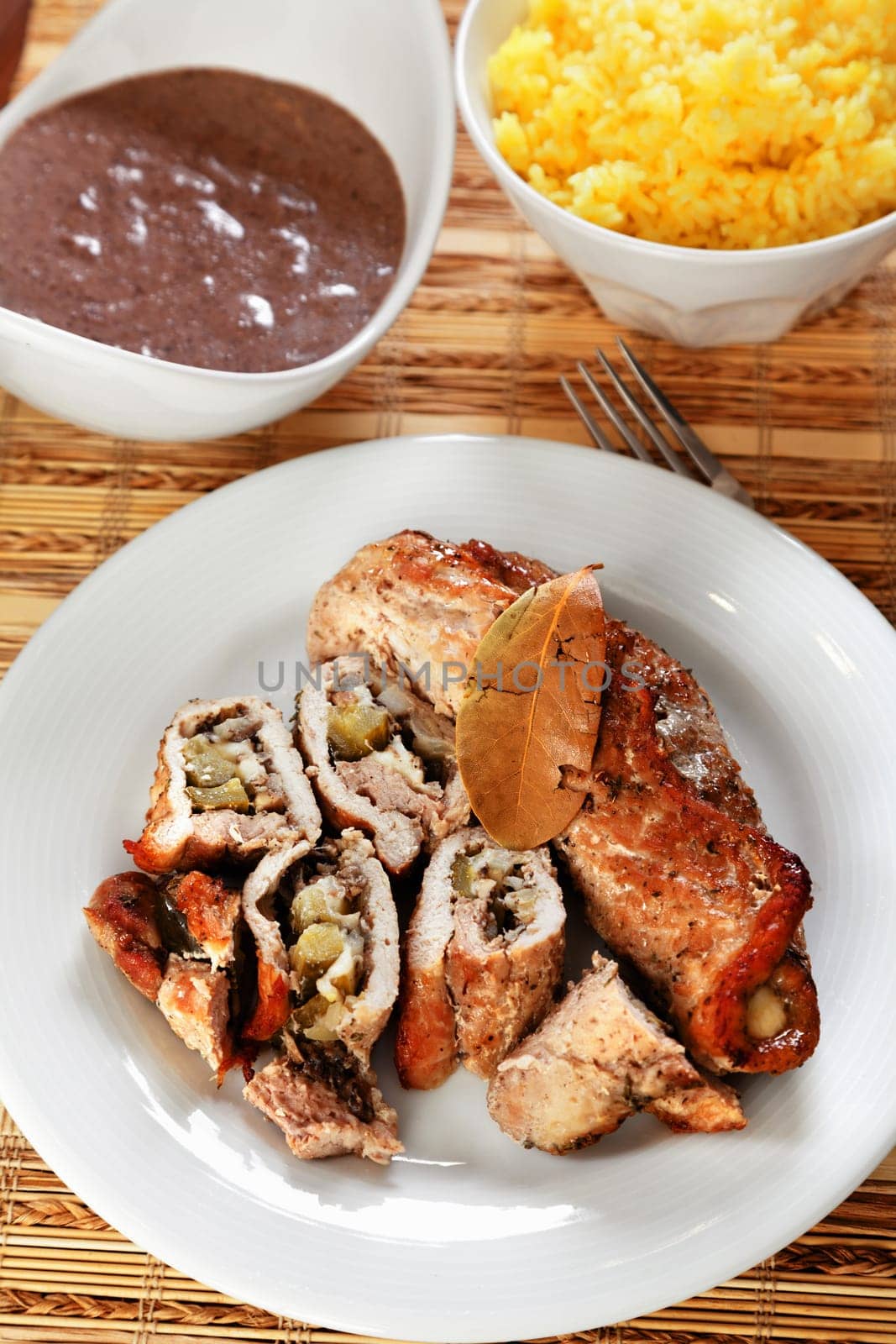 Pork roulades with mushrooms, marinated cucumbers and yellow cheese