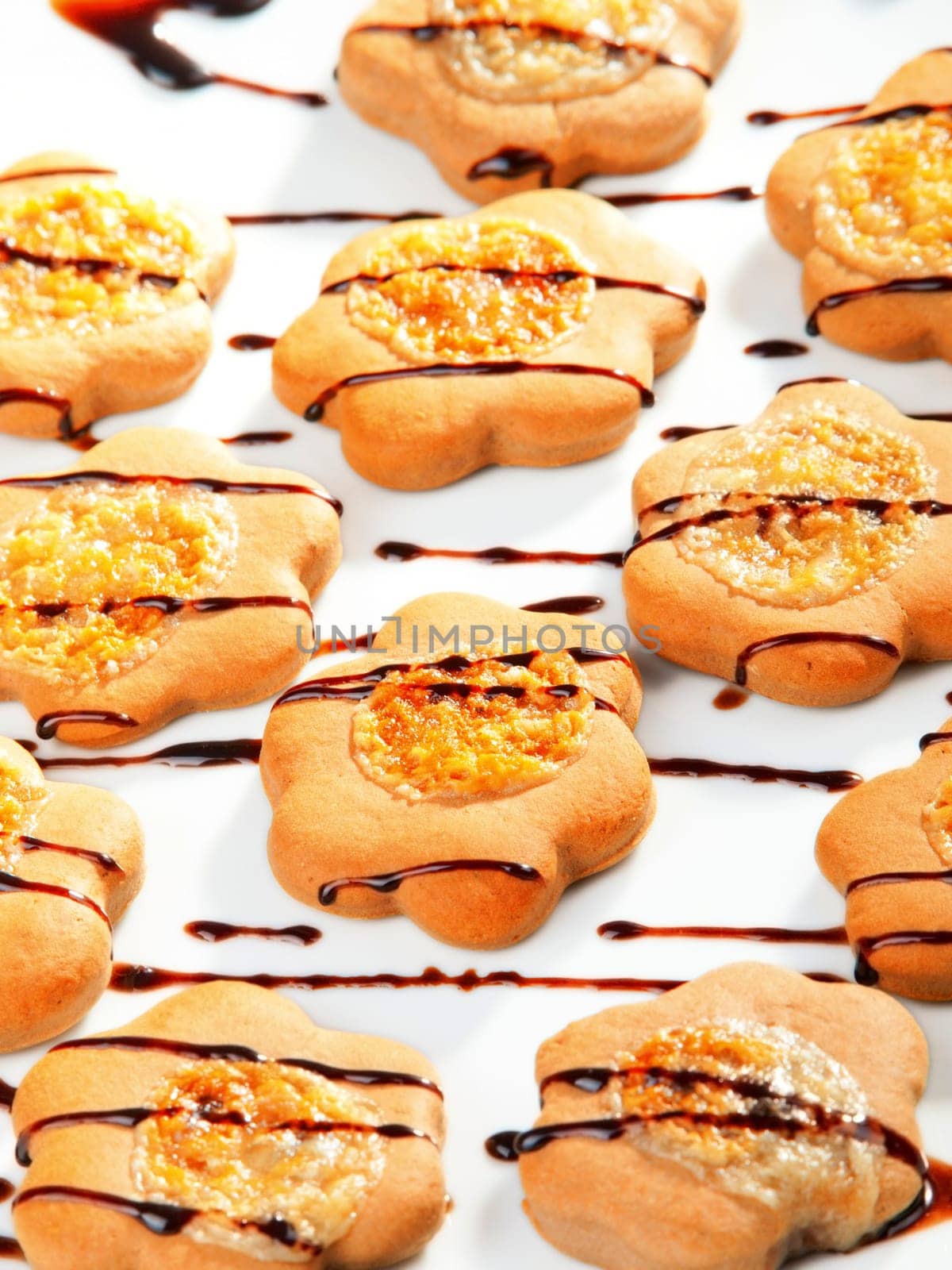 Cookies with chocolate toppling