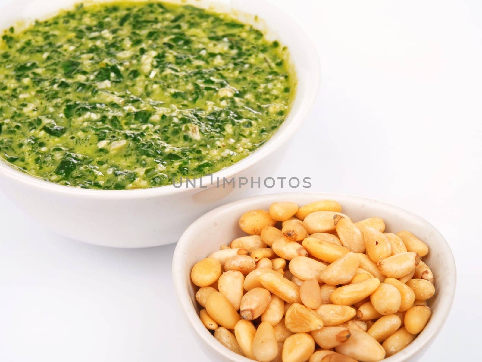 Pesto sauce isolated on white