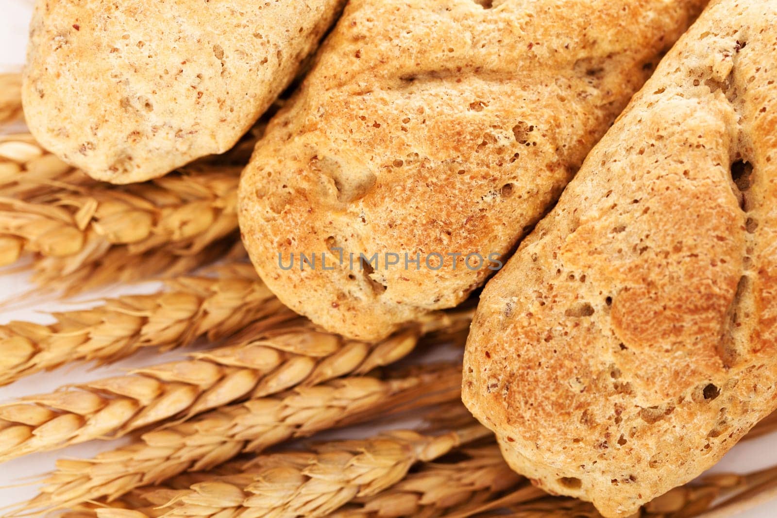 Homemade baguettes with raw wheat