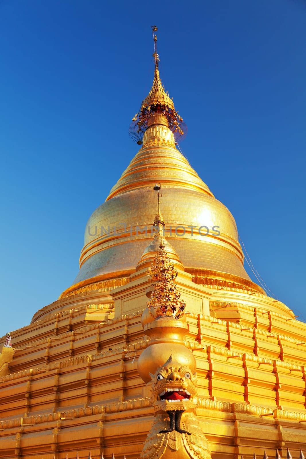 The Maha Lawka Marazein Pagoda at the center of the Kuthodaw Pagoda. Kuthodaw Pagoda is a Buddhist stupa, located in Mandalay, Burma (Myanmar), that contains the world's largest book. It lies at the foot of Mandalay Hill. In the grounds of the pagoda are 729 stone-inscription caves, each containing a marble slab inscribed on both sides with a page of text from the Tipitaka, the entire Pali Canon of Theravada Buddhism. Pagoda Kuthodaw stretching from 1860 to 1868 during the reign of King Mindona.