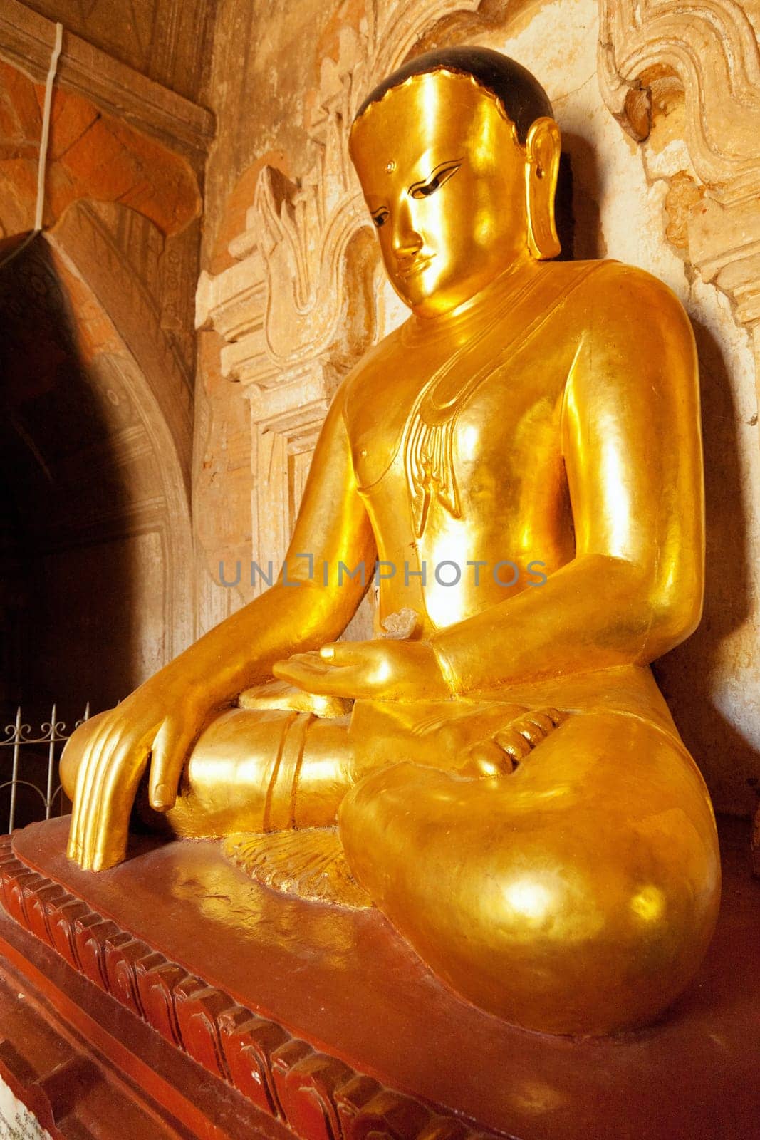 Close up of statue of Bhudda in earth-touching mudra. Photo taken in Ananda Temple, Bagan, Myanmar