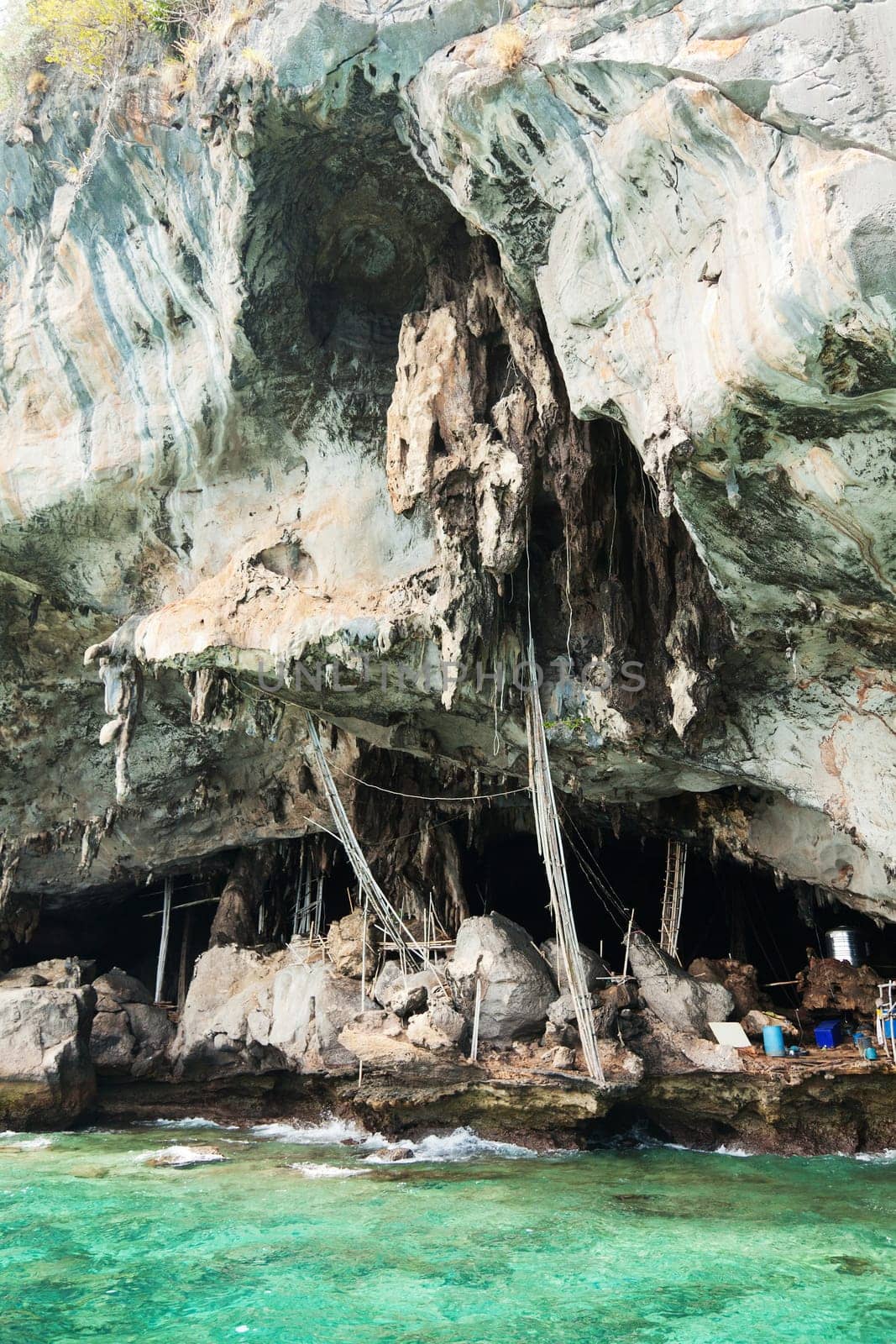 A cave in Koh Lao Liang Tai island in Andaman Sea near Phuket used for harvesting swallow's nests. The nests of Edible-nest Swiftlet swallow are used for making the famous Chinese Bird-Nest soup. Tha main component of the nest is the saliva of the bird which is rich in nutrients. A kilogram of nests costs between 2000 i 10000$.