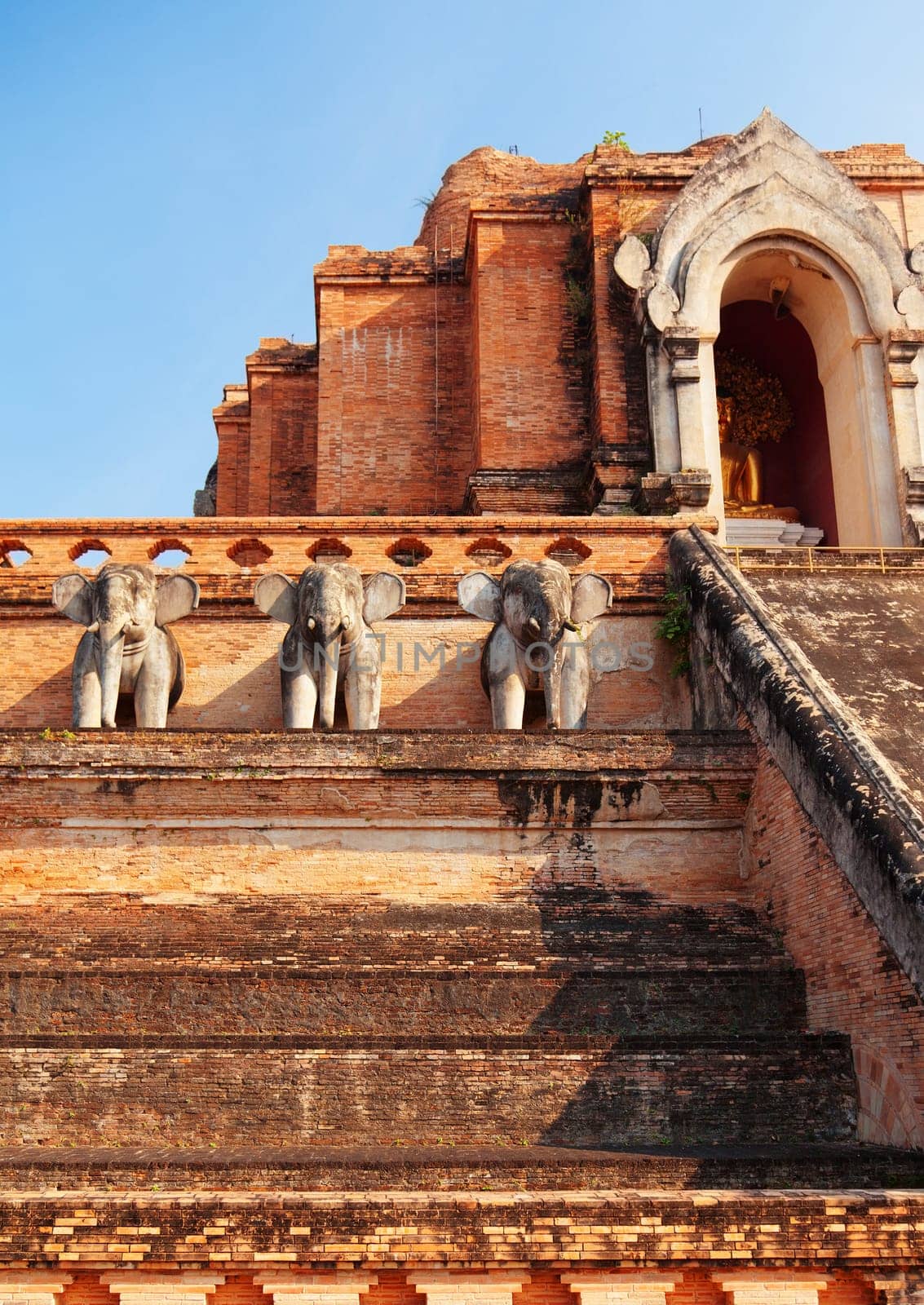 Wat Chedi Luang is a Buddhist temple in the historic centre of Chiang Mai, Thailand. The current temple grounds were originally made up of three temples ? Wat Chedi Luang, Wat Ho Tham and Wat Sukmin.
