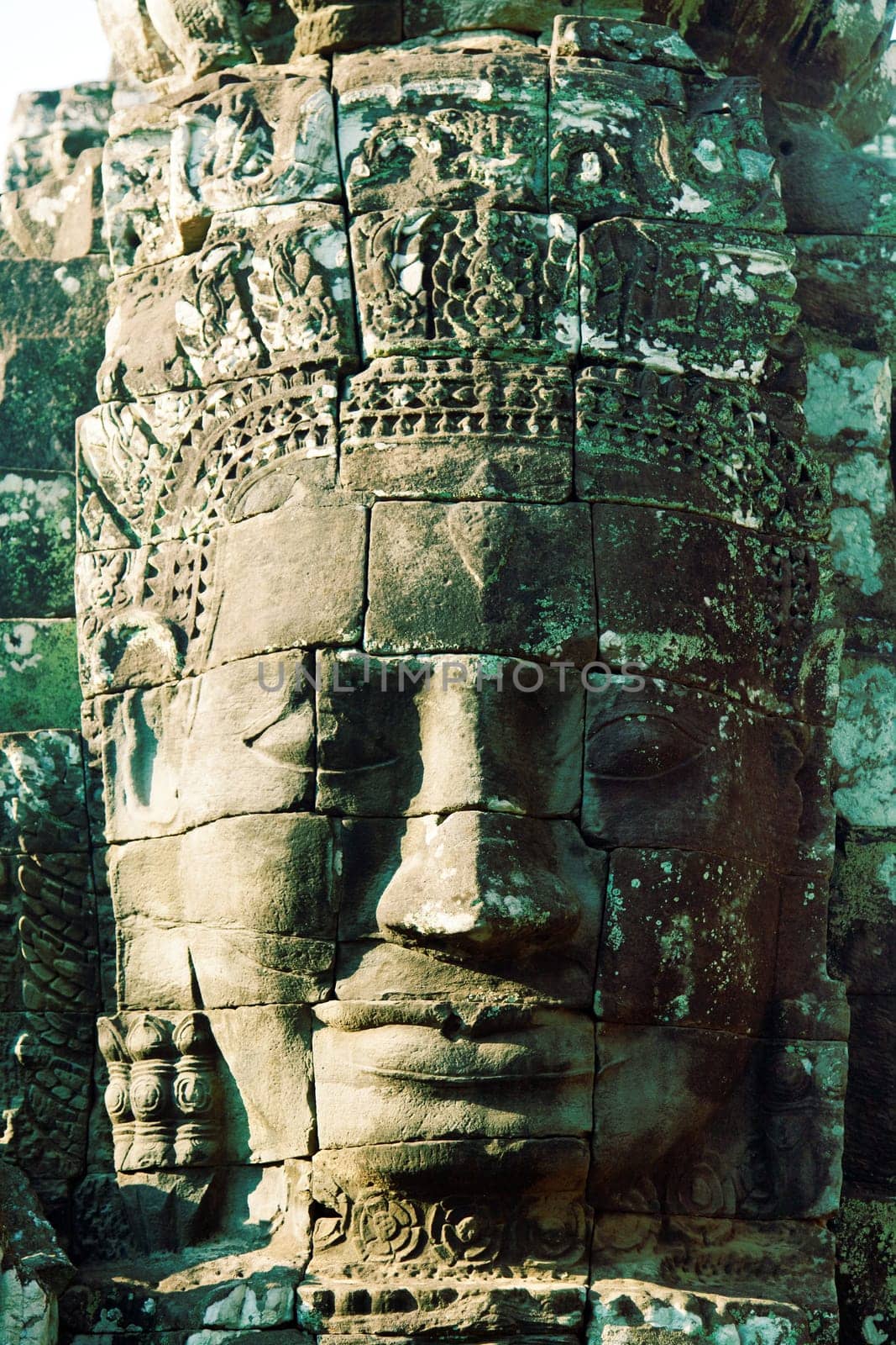 Close up of a large stone carved face of Bayon Temple in Angkor Thom, Angkor district, Siem Reap, Cambodia