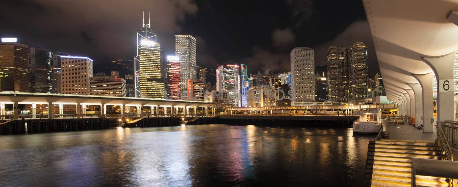 Hong Kong Skyline from Central Ferry Pier at Night Panorama