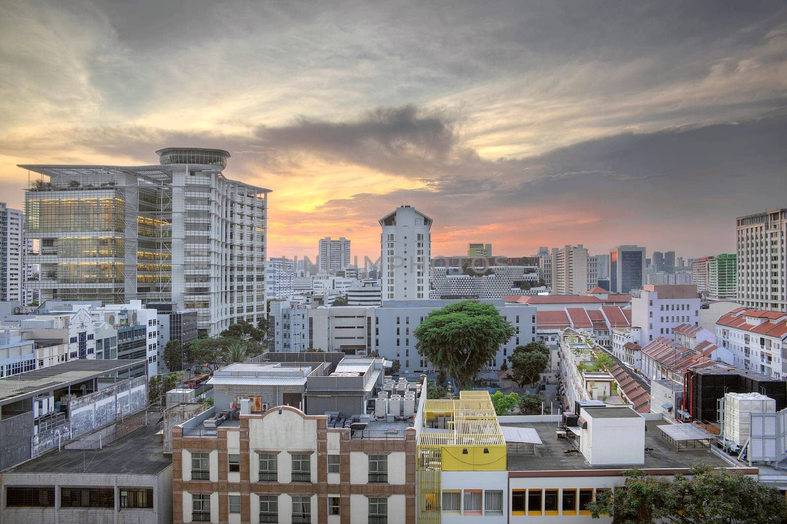 Bugis Junction Area in Singapore with Modern and Traditional Buildings Cityscape at Sunset
