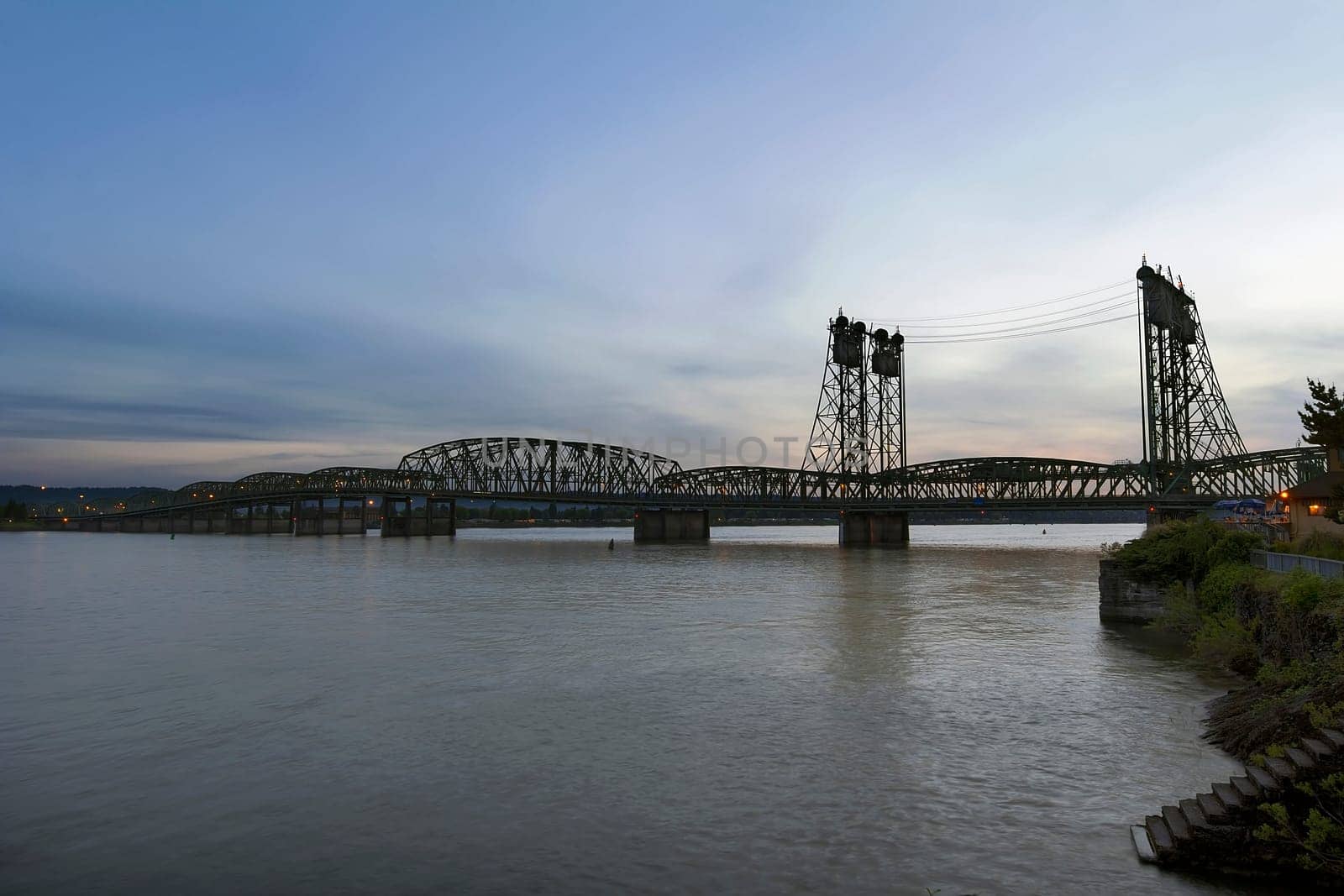 Interstate Bridge I-5 Over Columbia River Waterfront After Sunset at Dusk Between Oregon and Washington States
