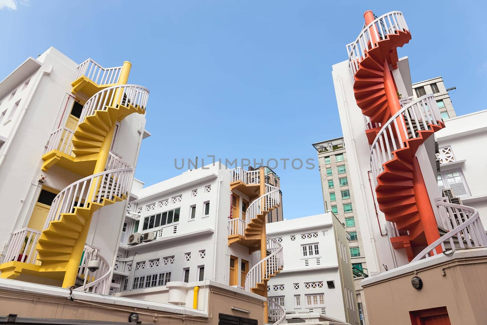 Colorful Spiral Staircase in the Back Alley of Bugis Village Area in Singapore