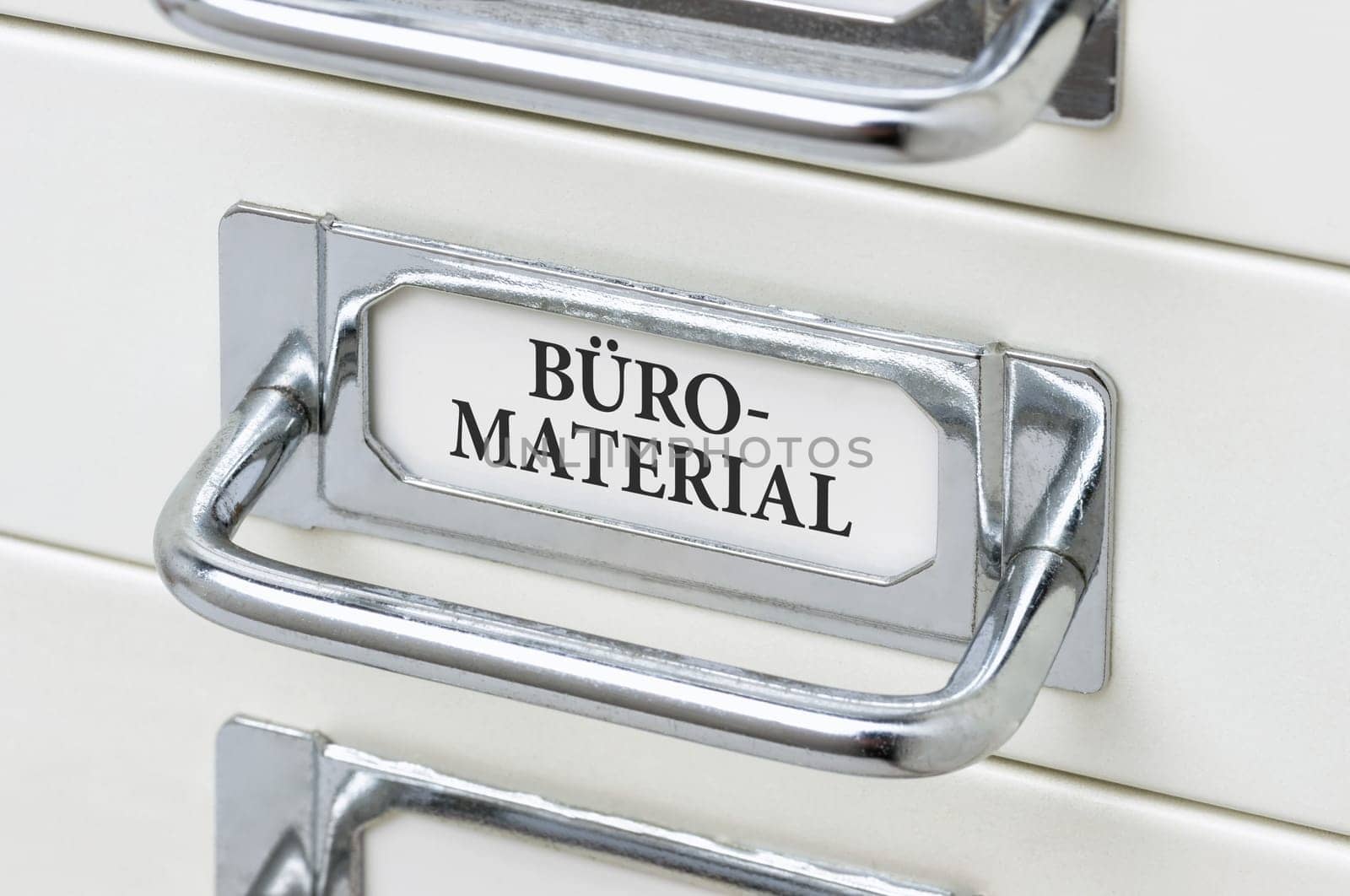 Drawer cabinet with the inscription office material