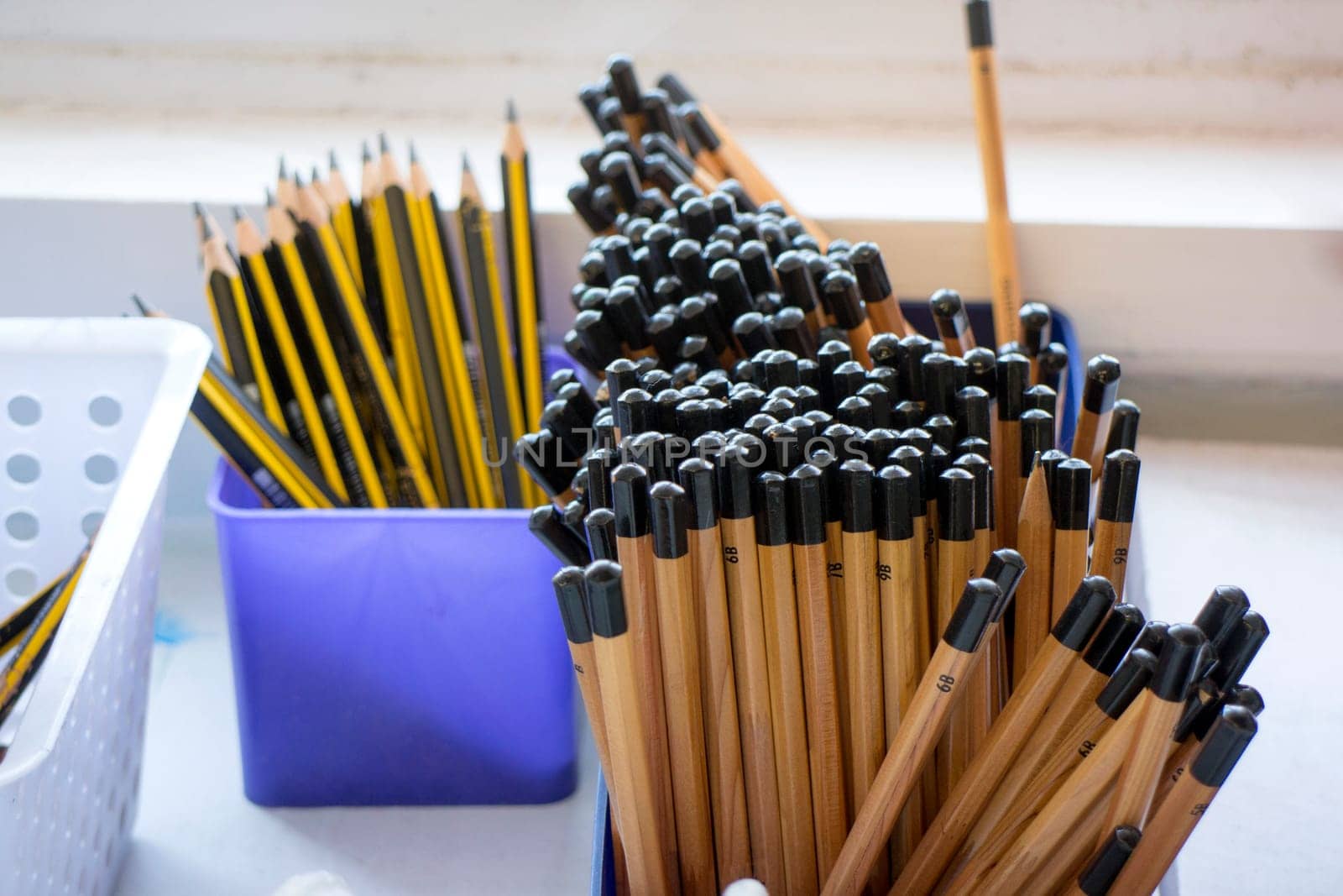 Tub of Pencils in a Classroom