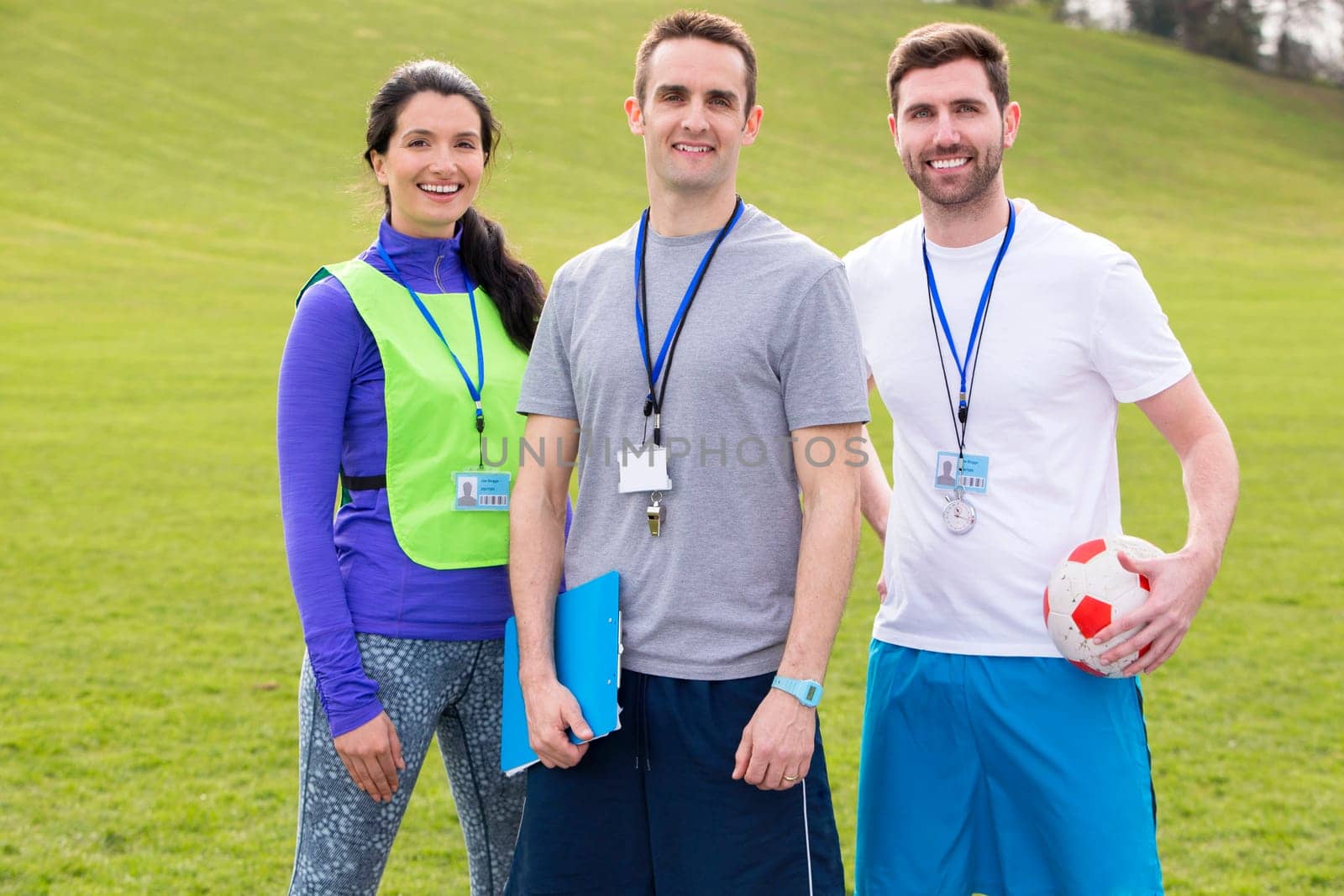 Small group of PE teachers smiling for a portrait