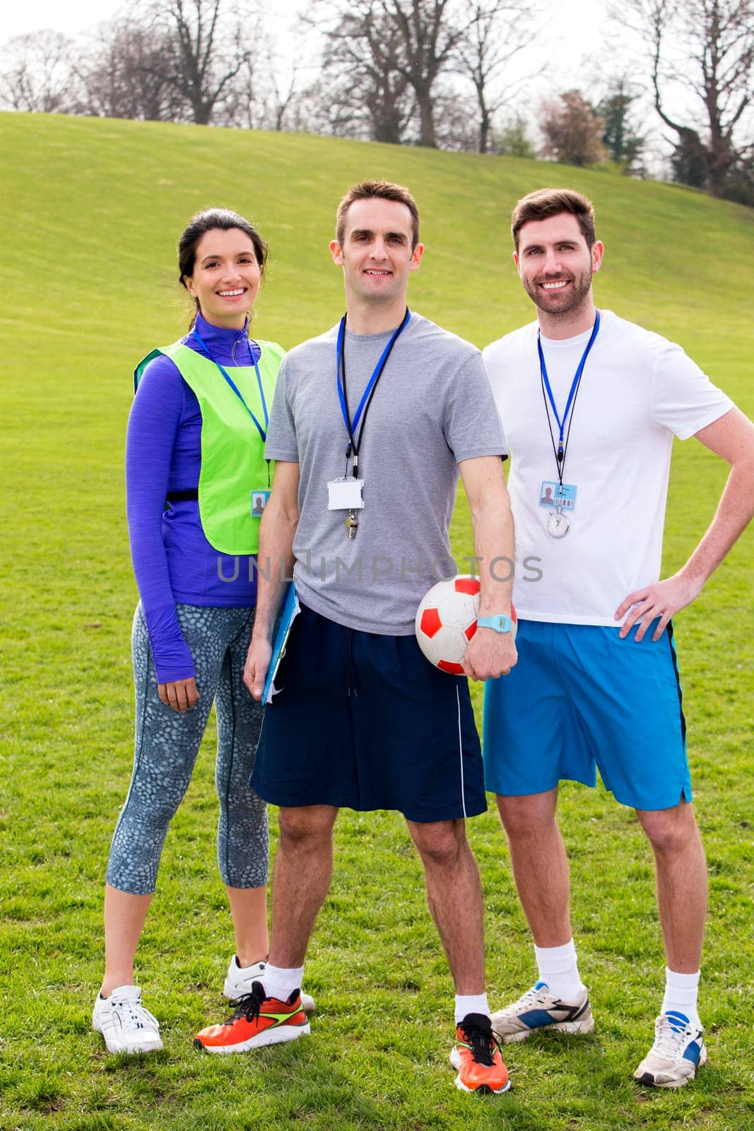 Small group of PE teachers smiling for a portrait