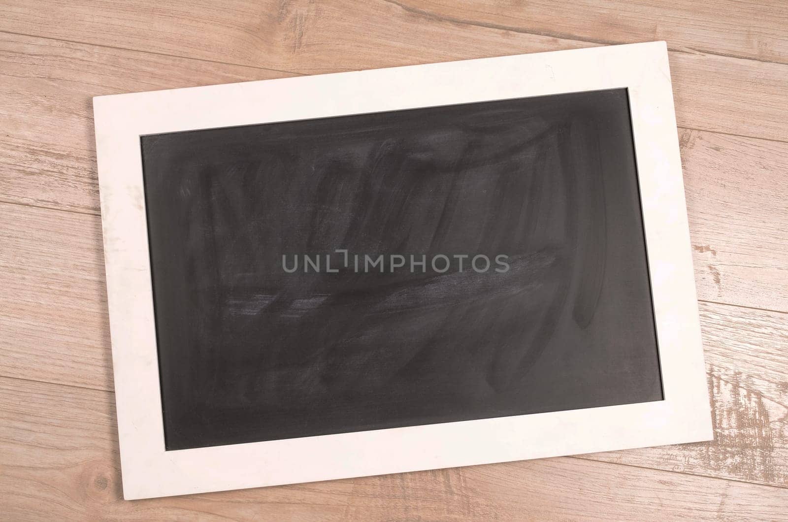Chalkboard on a rustic wooden background