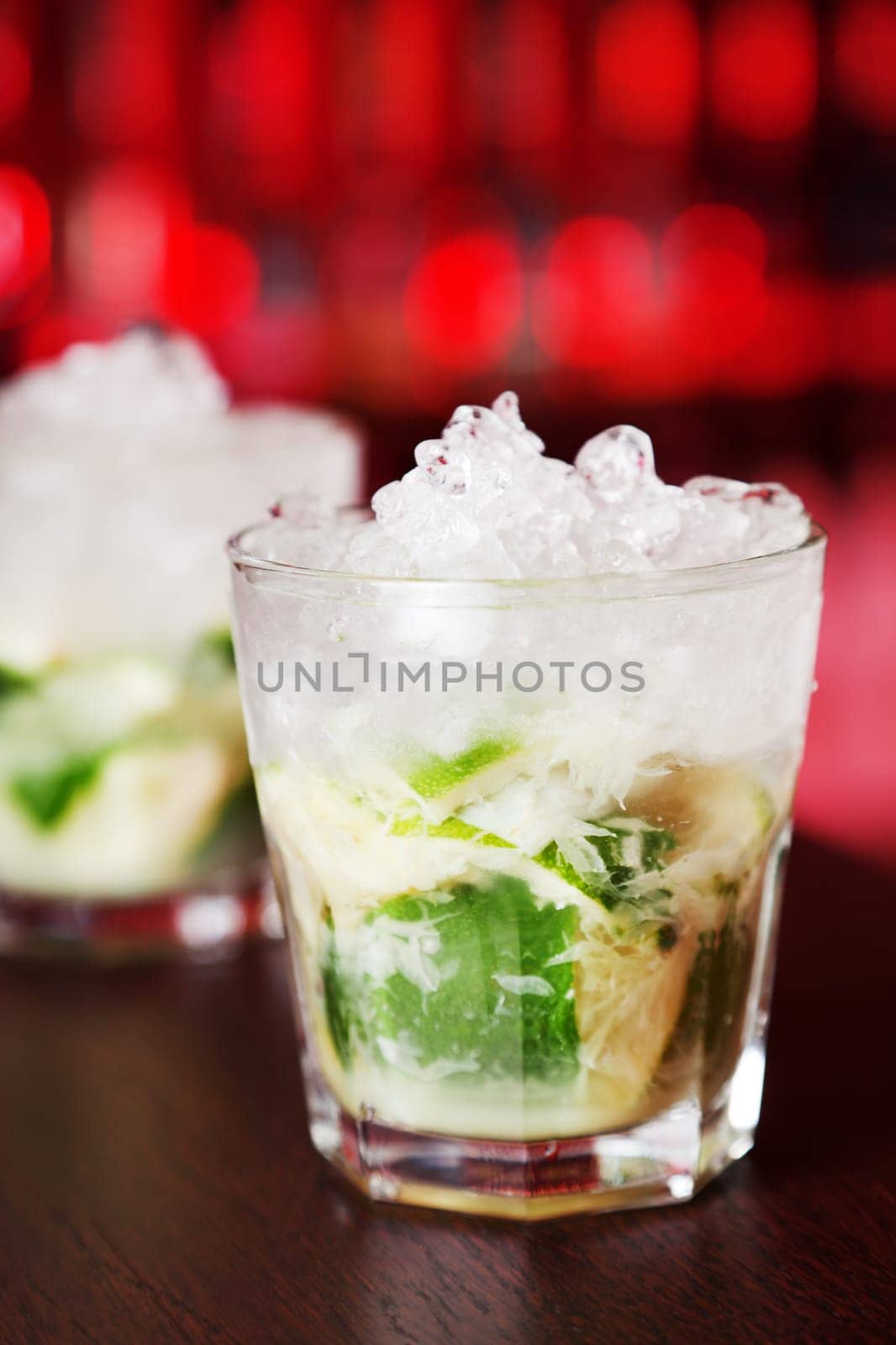 Caipirinha cocktail comes from Brazil and is considered a characteristic drink of the country. It's simplicity, sweetness and popularity all over the world has made it one of the 50 greatest drinks of all time...It's name is derived from the word &quot caipira&quot wich refers to someone from the contryside. It's Portuguese name is feminine, meaning &quot country girl&quot . ..Original Caipirinha is made of