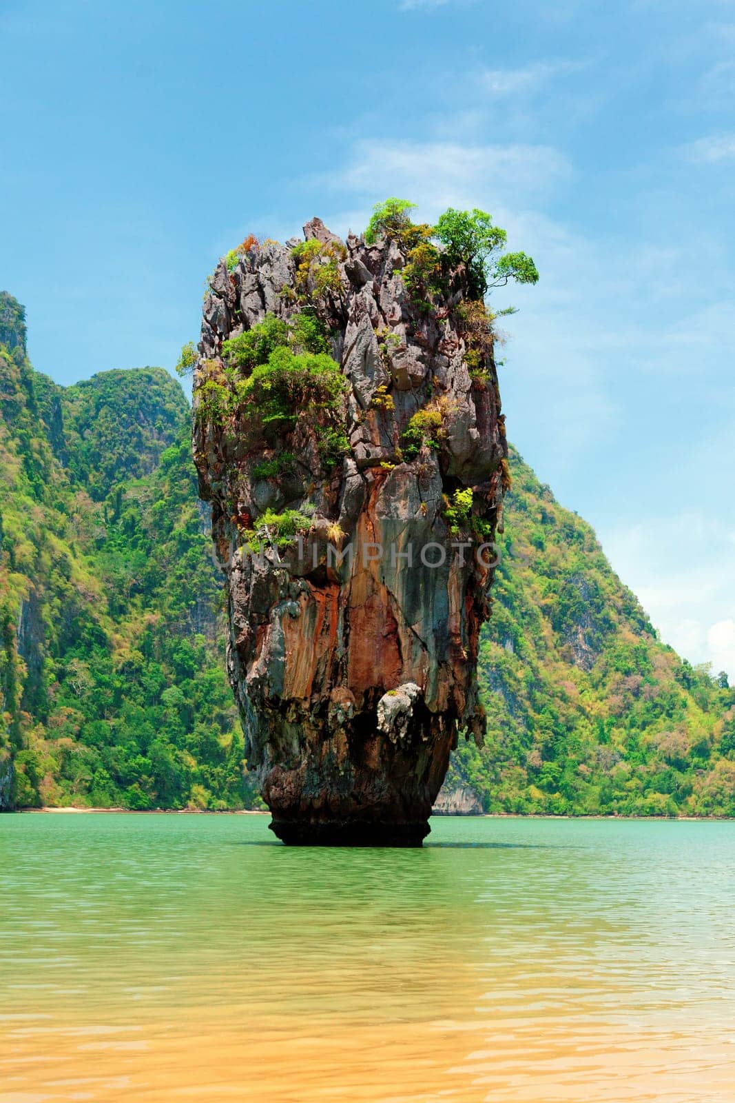 Khao Phing Kan is a pair of islands on the west coast of Thailand, in the Phang Nga Bay, Andaman Sea, near Phuket. About 40 metres from its shores lies a 20 meters tall islet Ko Tapu or Khao Tapu. The island is a part of the Ao Phang Nga National Park. Since 1974, when it was featured in the James Bond movie The Man with the Golden Gun, it is popularly called James Bond Island.