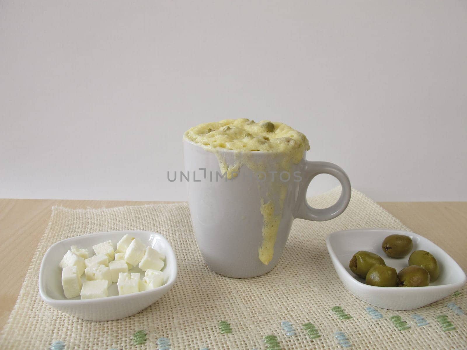 Homemade Mug Cake with olives and feta cheese