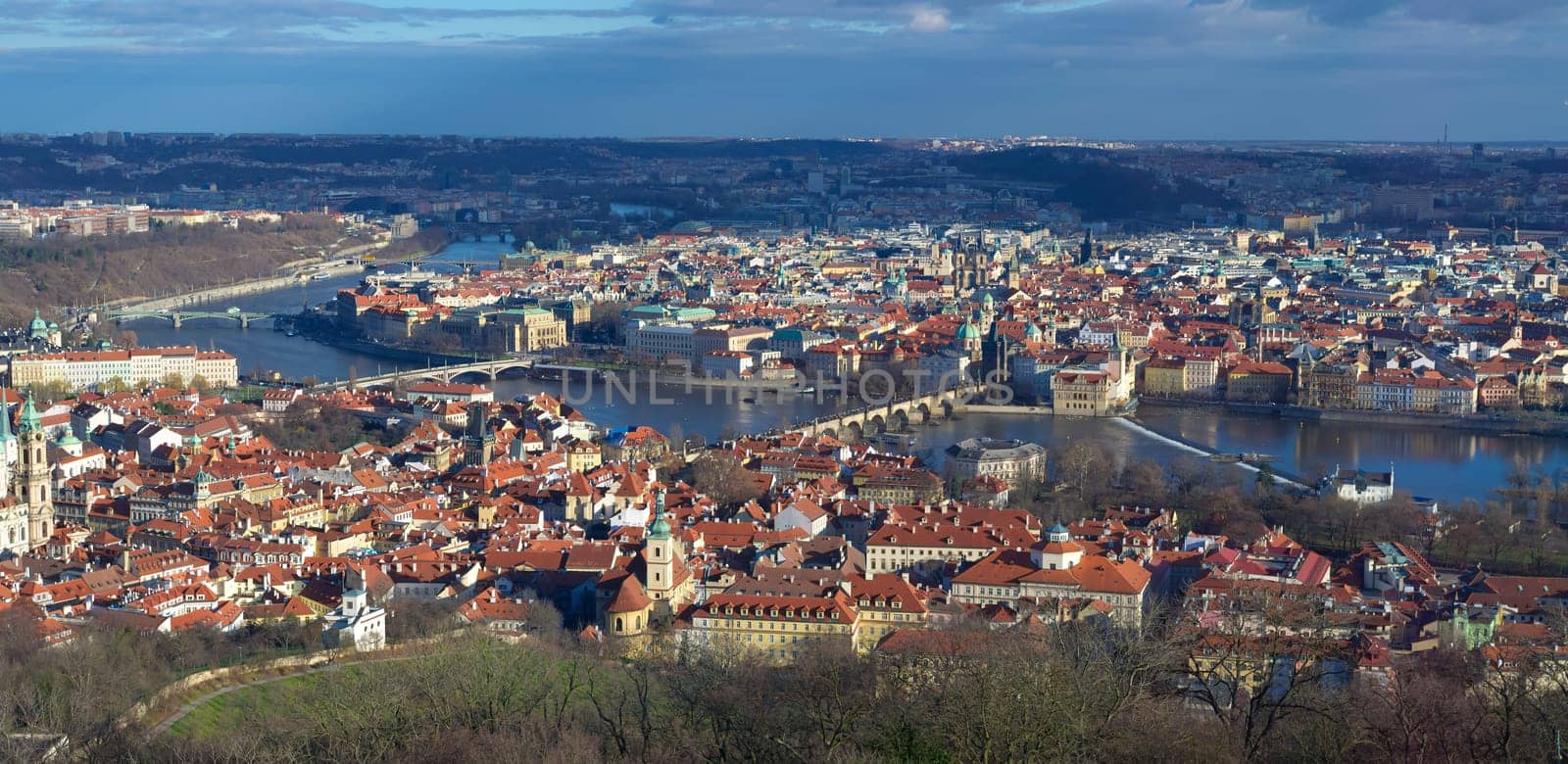 wide angle view over prague with the old town over the river