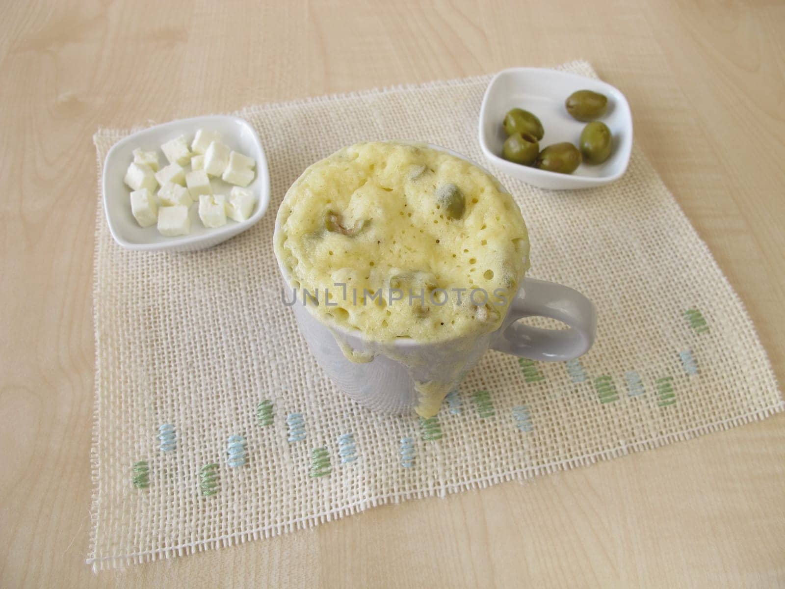 Homemade Mug Cake with olives and feta cheese