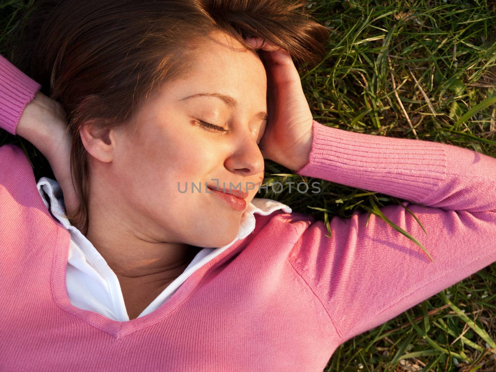 Woman sleeping on the grass